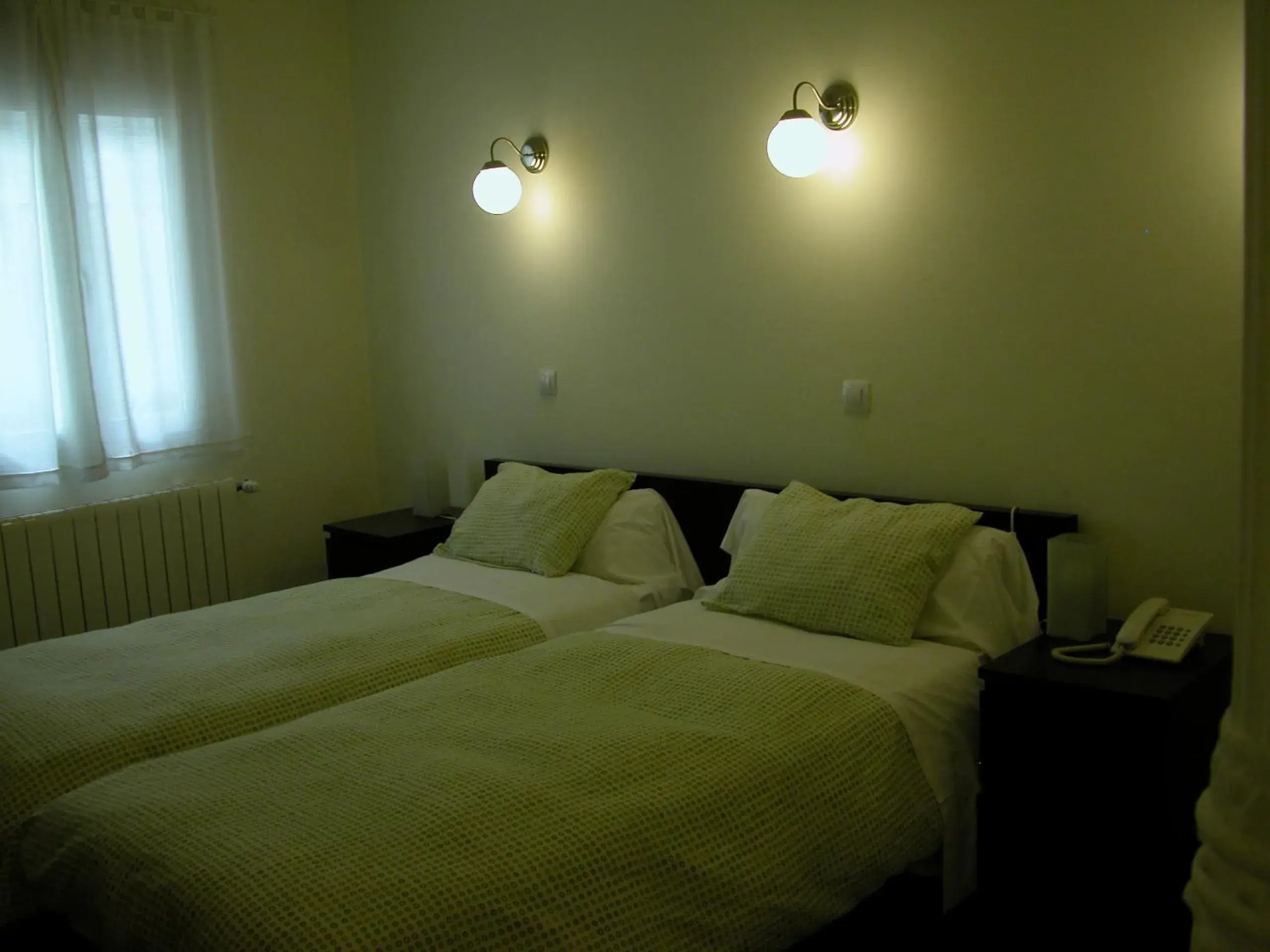 Photo of the whole room, Bed in Hostal Goyal Pizarro