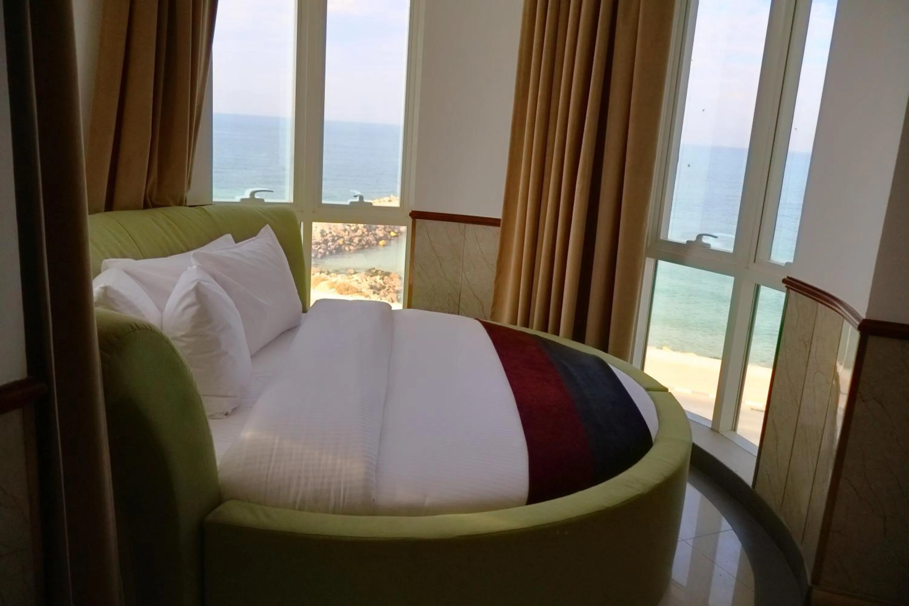 Bed in Claridge Star Hotel