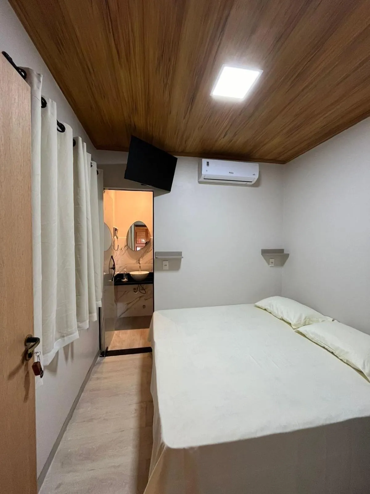 Bed in Pousada Raízes São Jorge