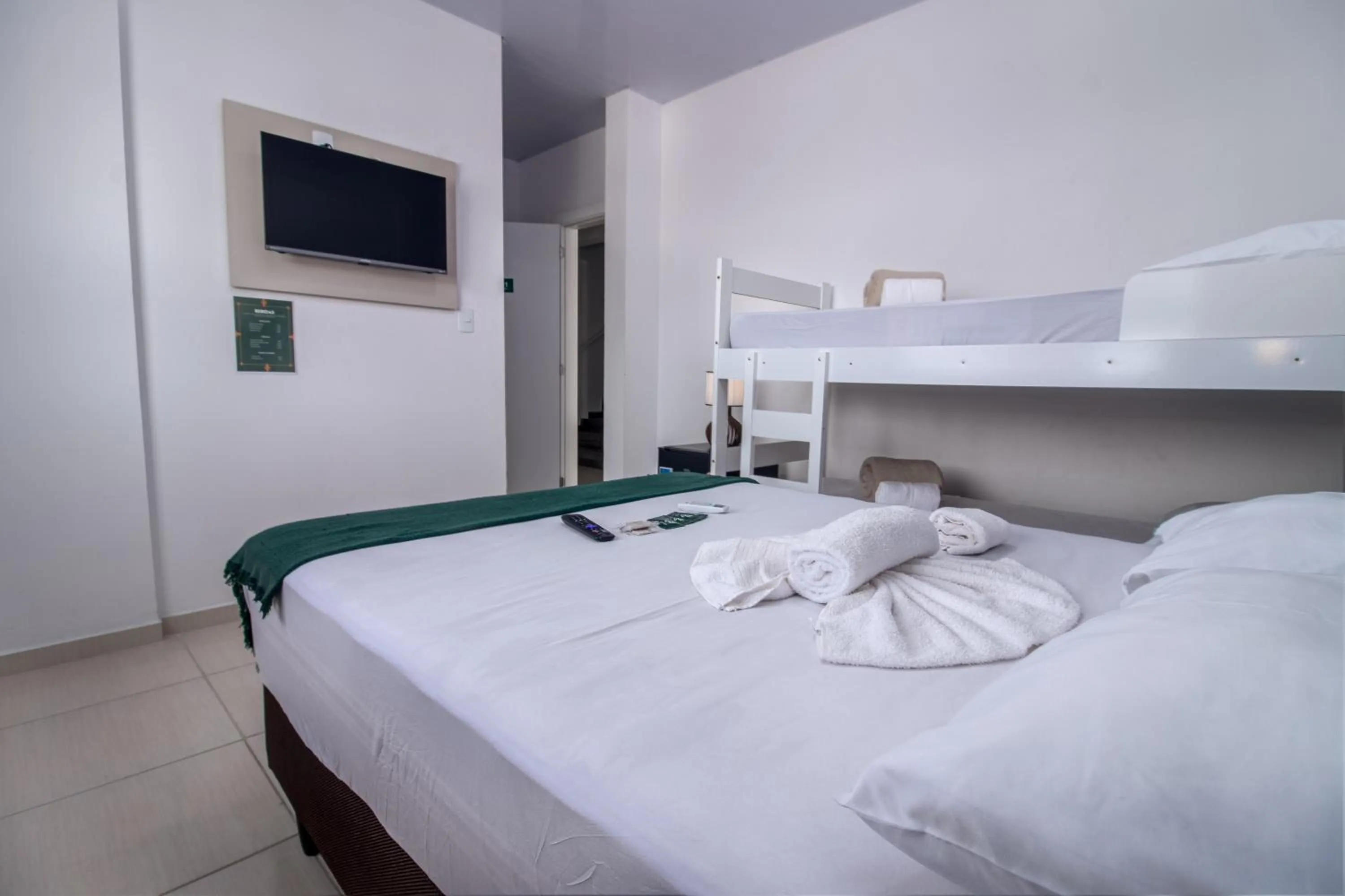 Bed in Pousada Paraná