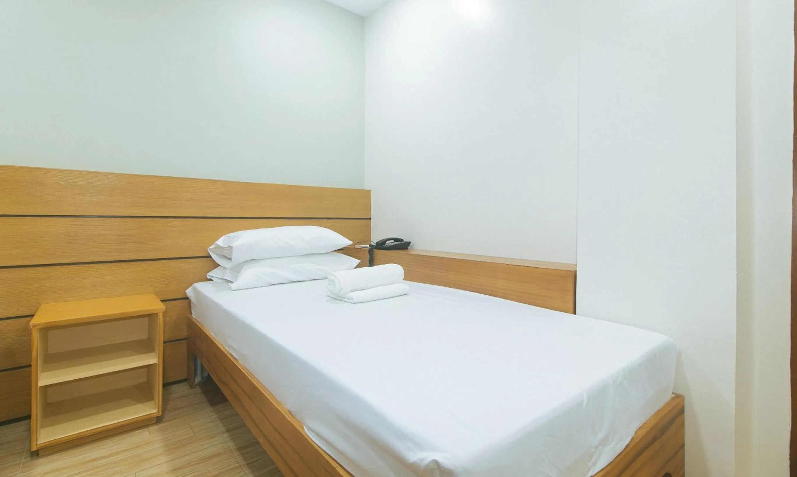 Bed in Avelida Homes by RedDoorz