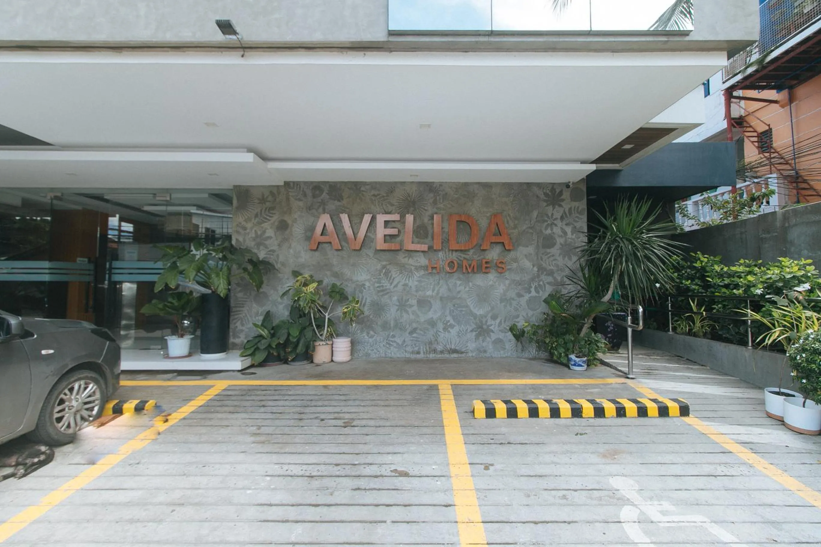 Facade/entrance in Avelida Homes by RedDoorz