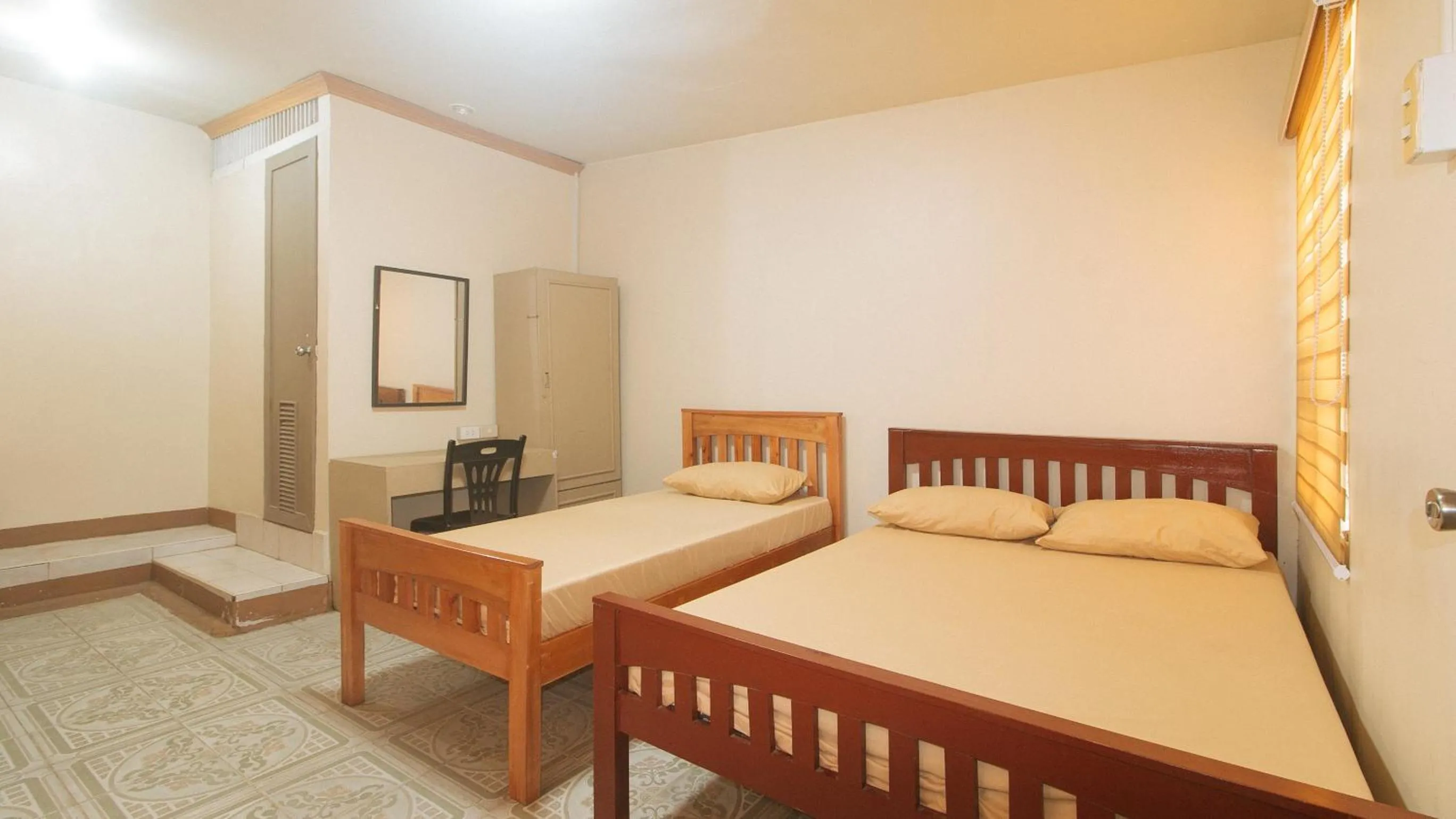 Photo of the whole room, Bed in Kababayan Pensione House by RedDoorz