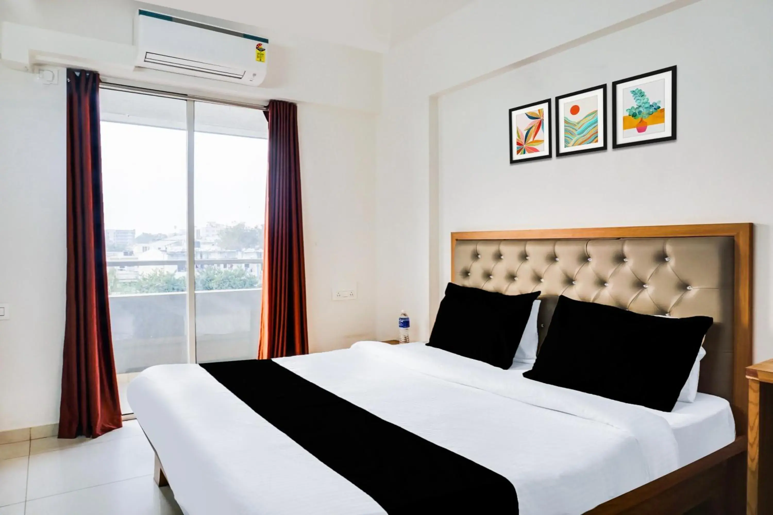 Bedroom, Bed in Super Townhouse Lohegaon Near Pune Airport formerly Landmark Regency Bedroom, Bed in Super Townhouse Lohegaon Near Pune Airport formerly Landmark Regency