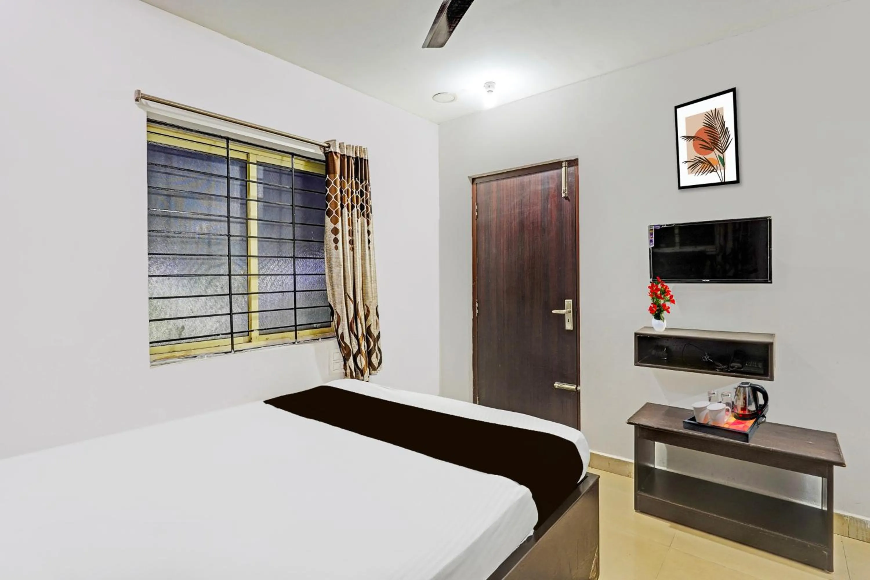 Bedroom, Bed in Collection O Vanamthopu Center Nellore Formerly ESR Guest Inn