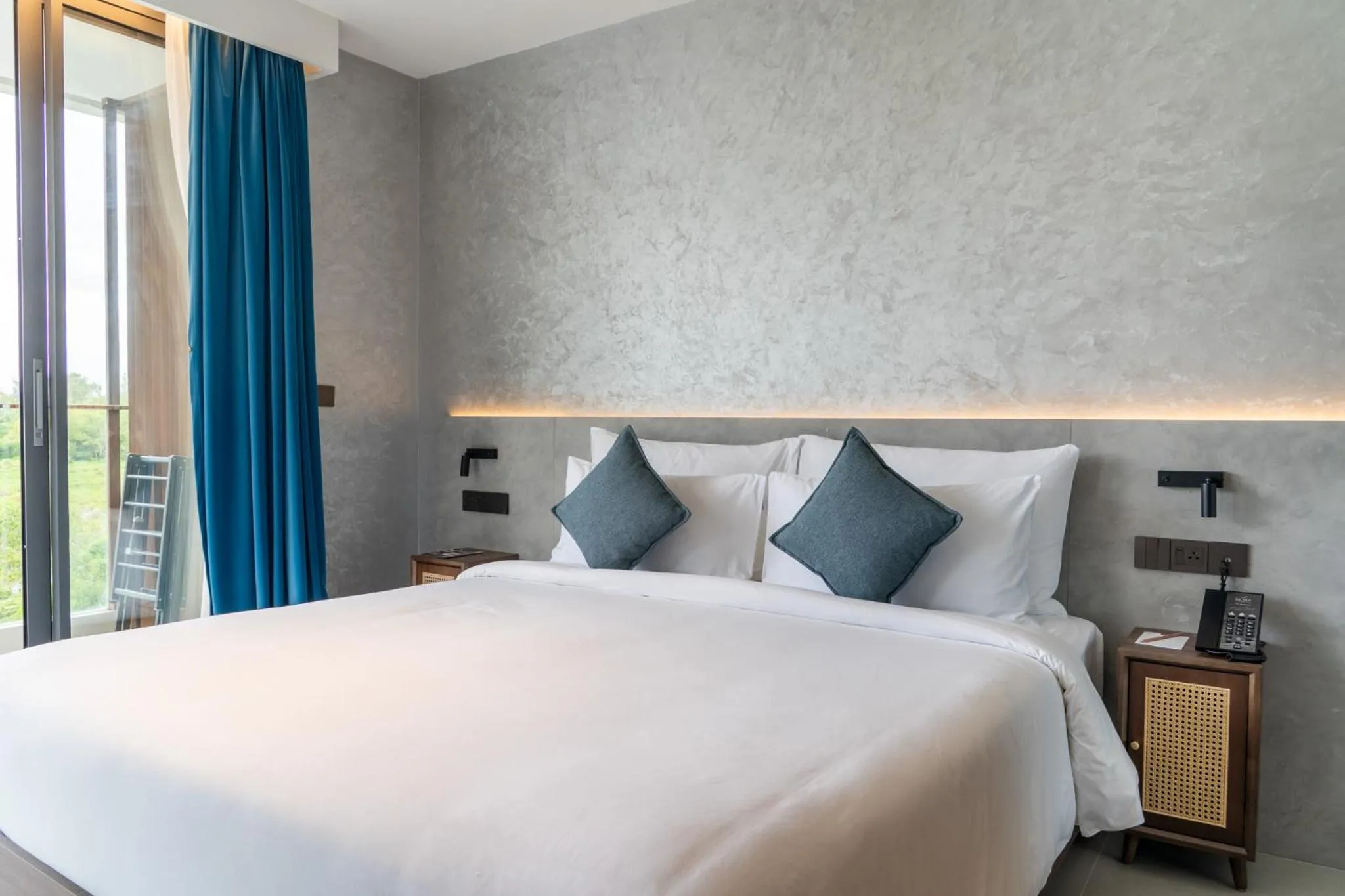 Bed in Kora Beach Resort Phuket