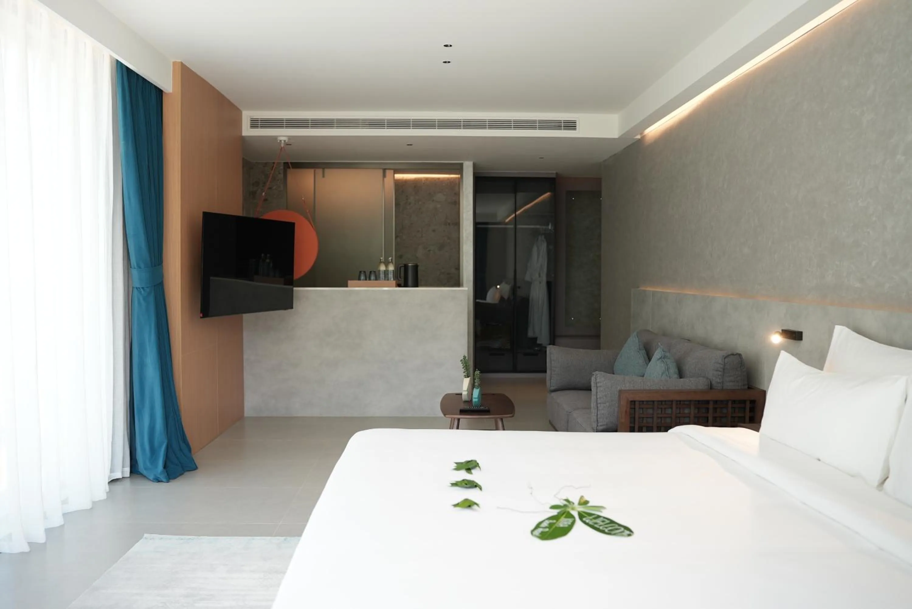 Seating area, Bed in Kora Beach Resort Phuket