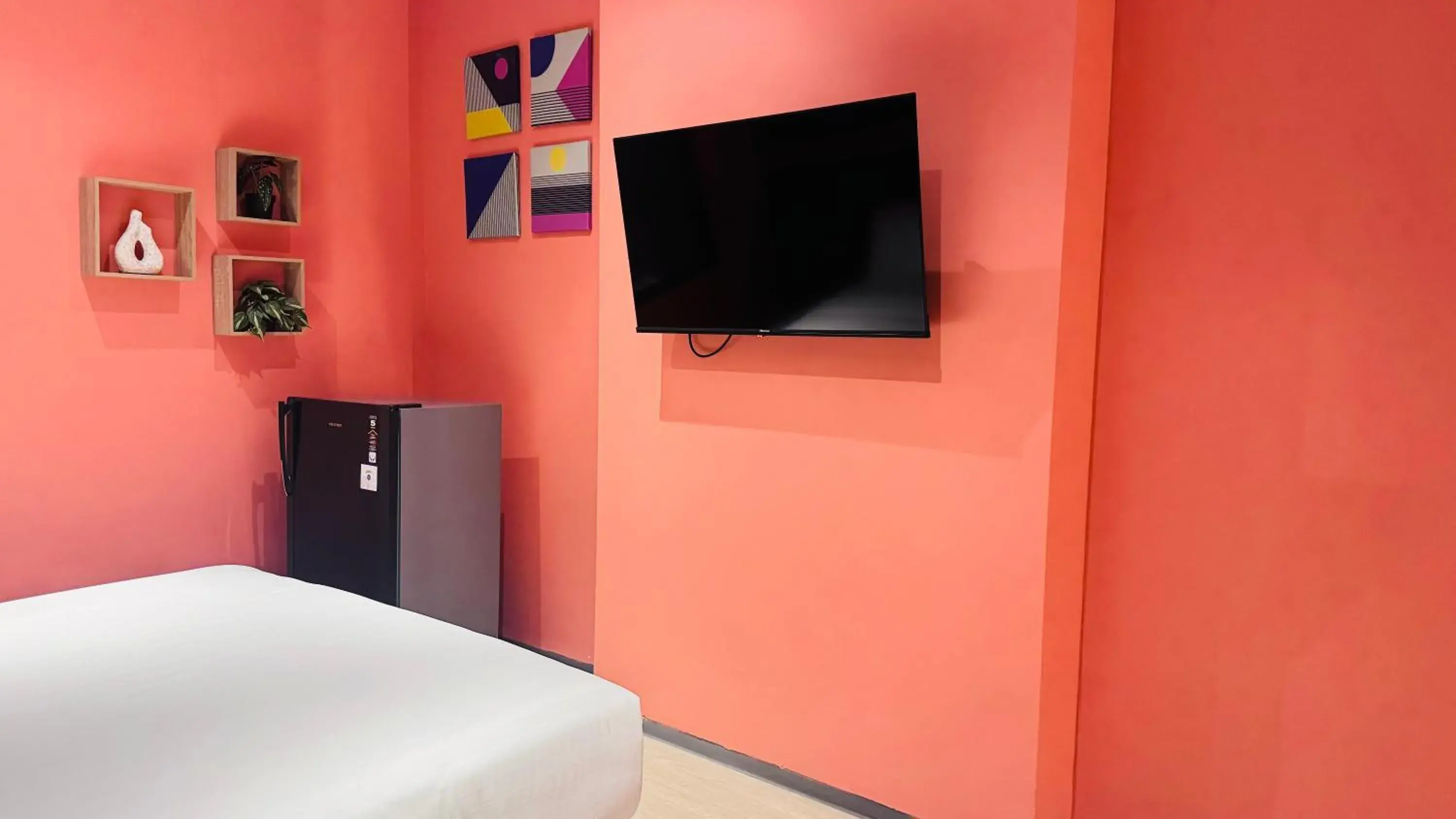 Bedroom in Yellow Bee Resort Cililitan Bedroom in Yellow Bee Resort Cililitan