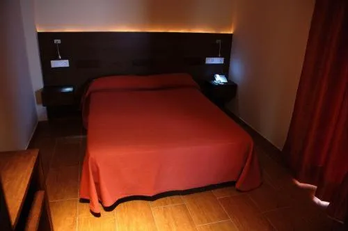 Bed in Hostal Los Coronales