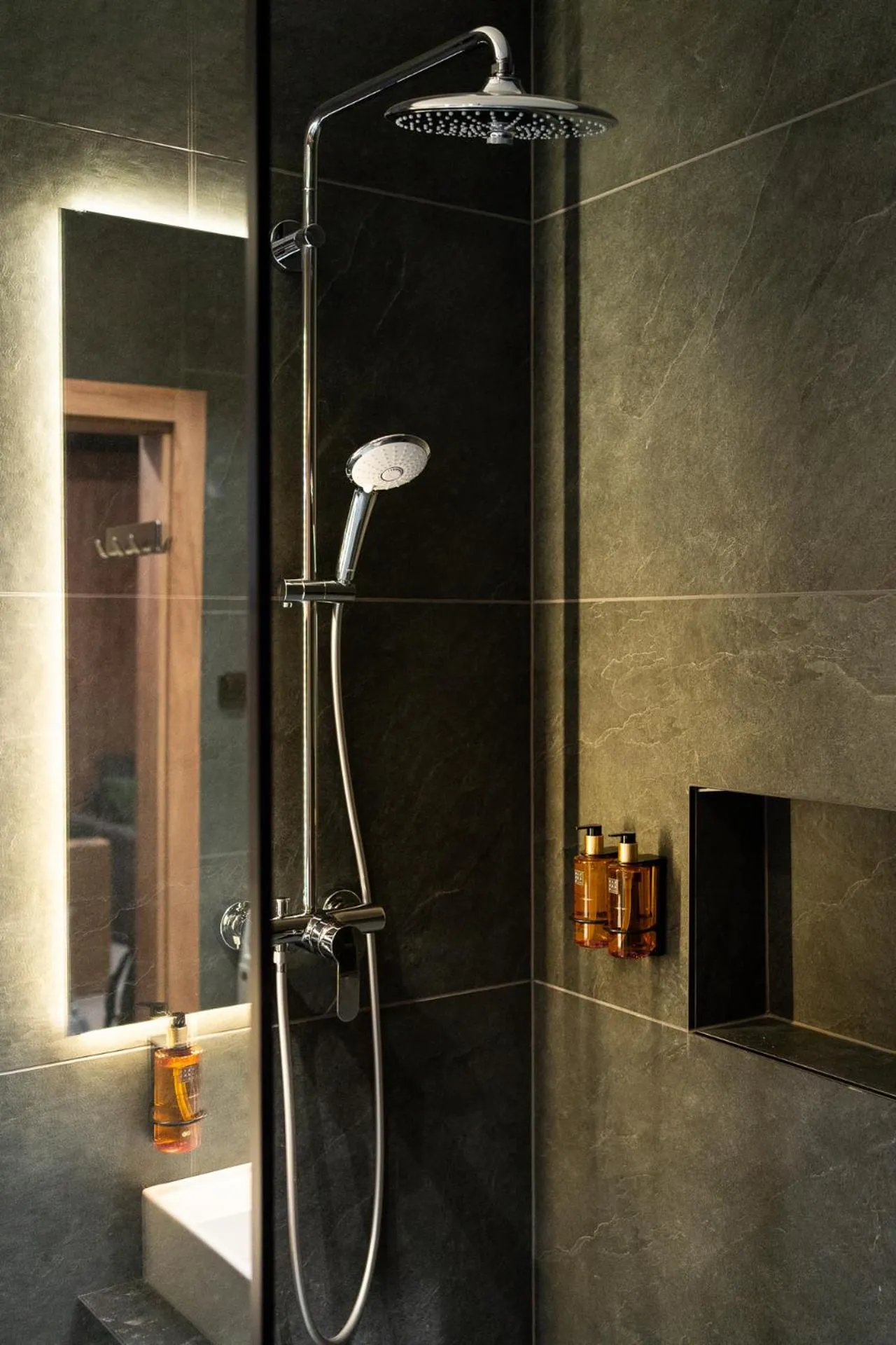 Shower in Cyrhla Apartamenty - sauna, playroom, free parking & wifi
