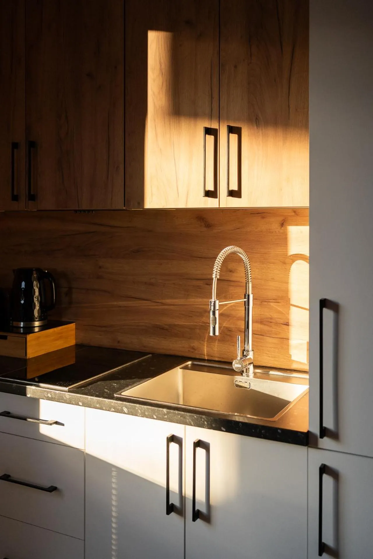 Kitchen or kitchenette in Cyrhla Apartamenty - sauna, playroom, free parking & wifi
