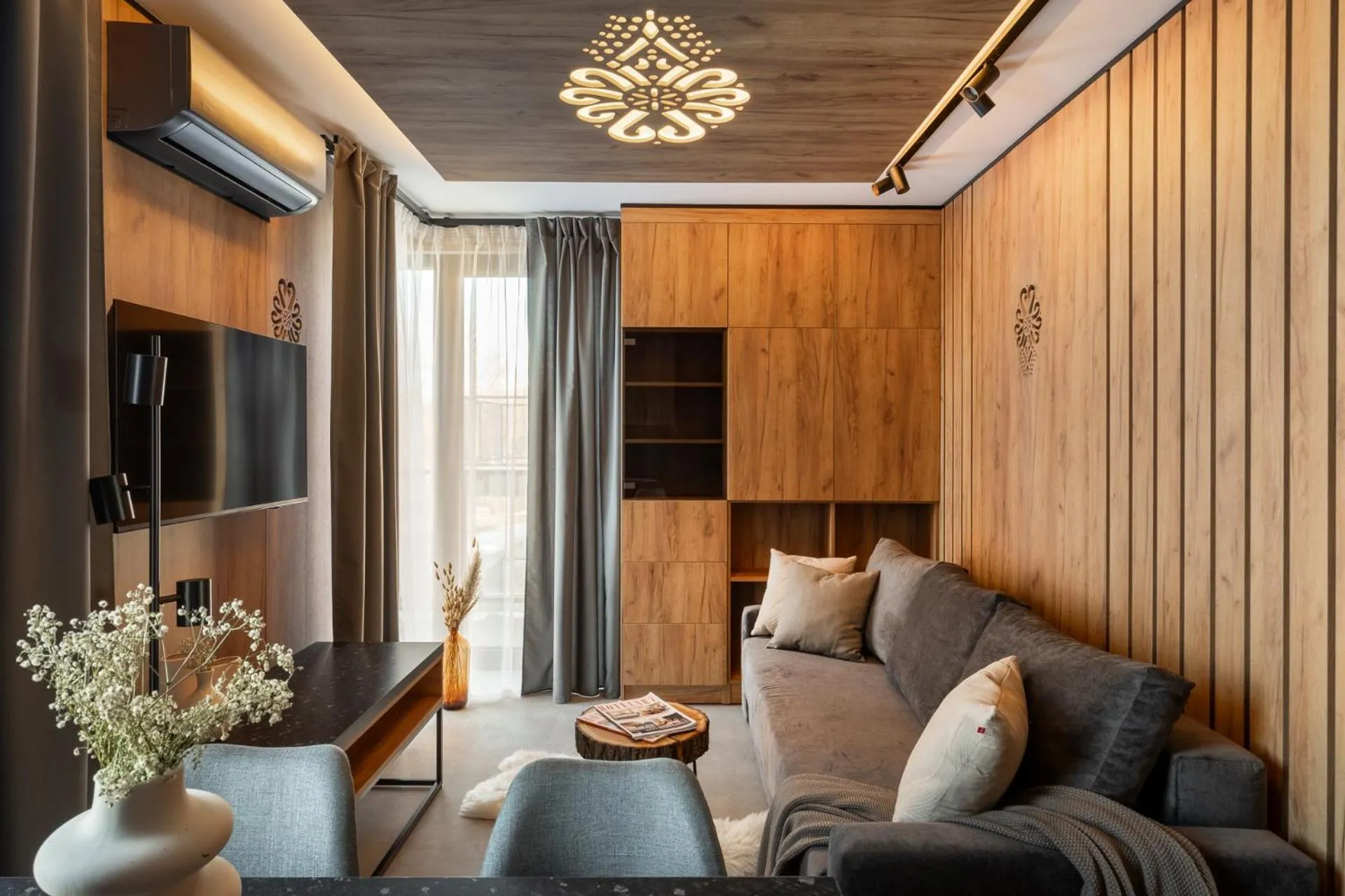 Living room in Cyrhla Apartamenty - sauna, playroom, free parking & wifi
