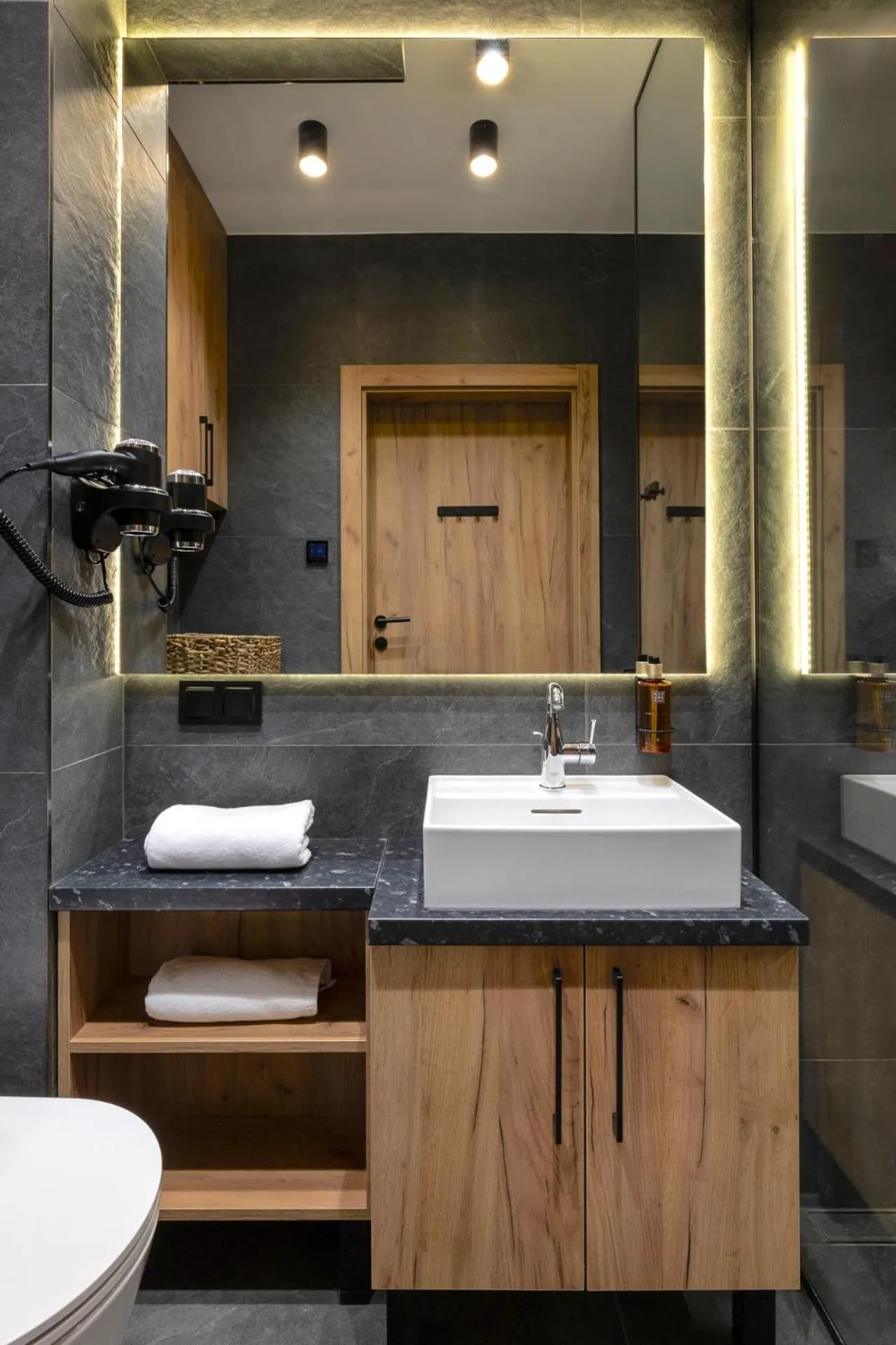 Bathroom in Cyrhla Apartamenty - sauna, playroom, free parking & wifi