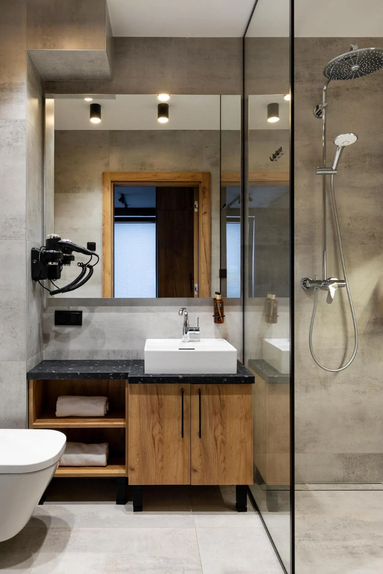Shower in Cyrhla Apartamenty - sauna, playroom, free parking & wifi