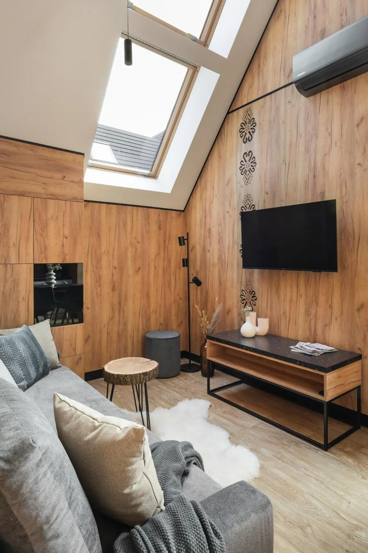 TV and multimedia in Cyrhla Apartamenty - sauna, playroom, free parking & wifi