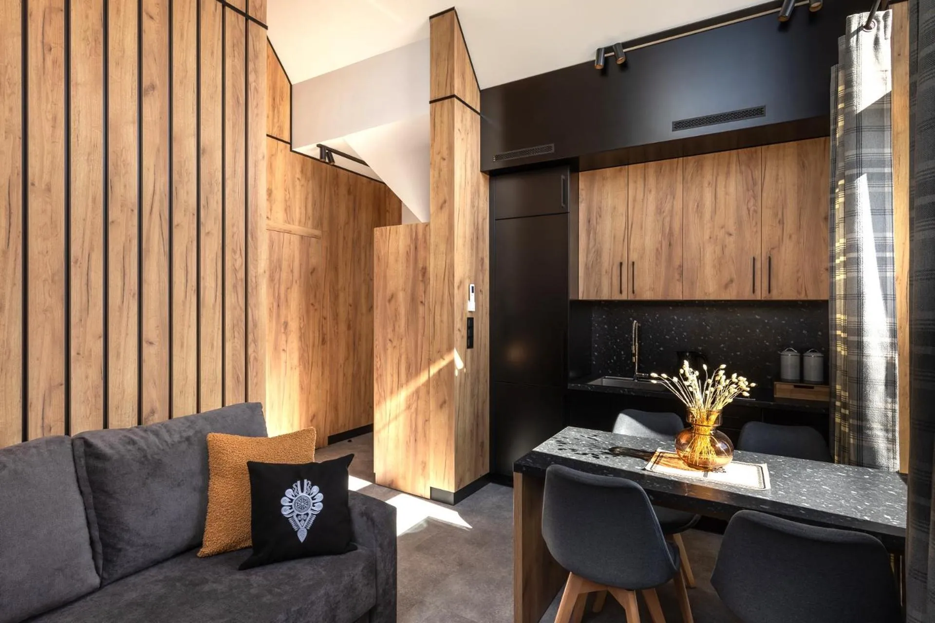 Kitchen or kitchenette in Cyrhla Apartamenty - sauna, playroom, free parking & wifi