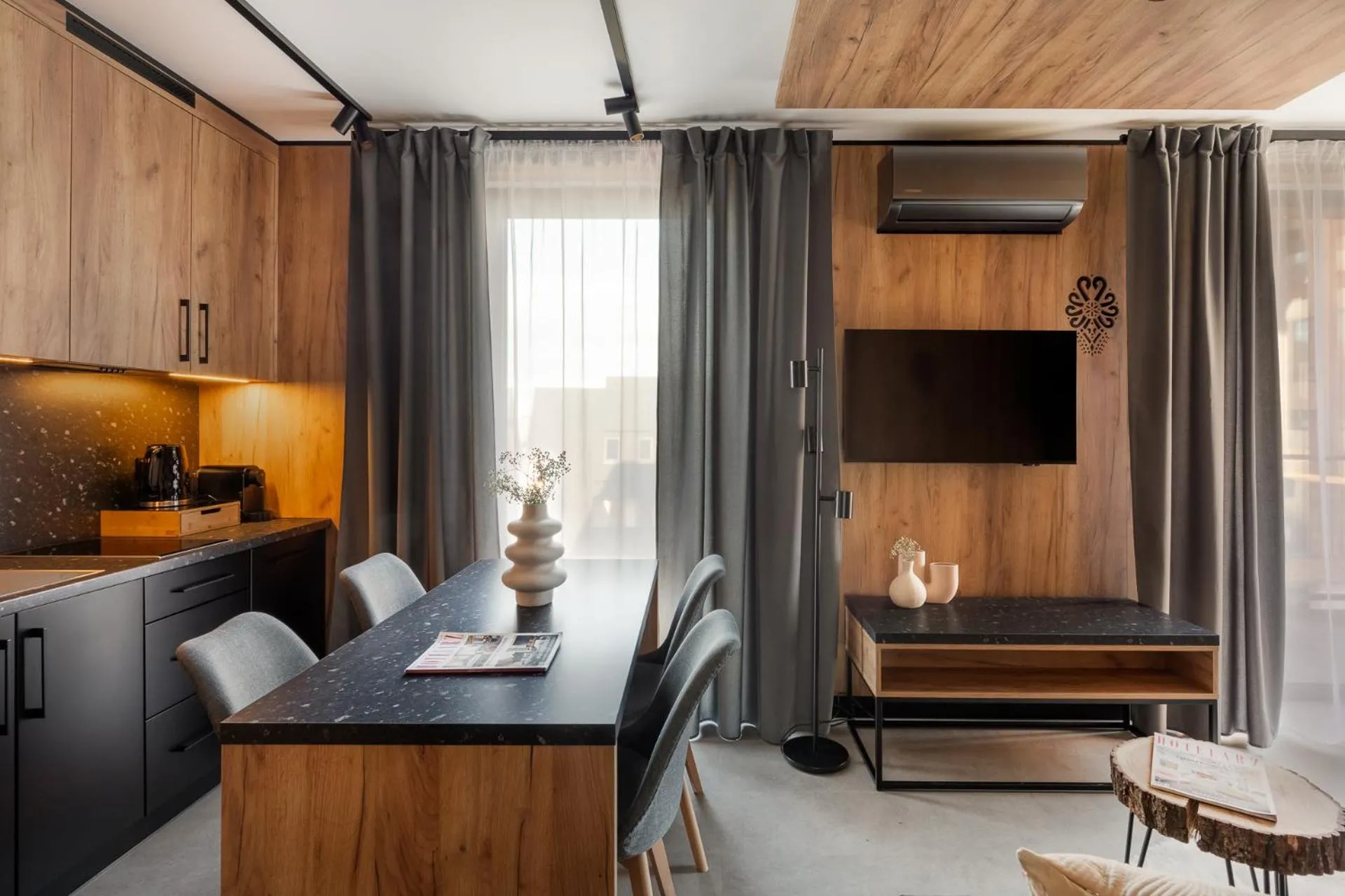 Kitchen or kitchenette in Cyrhla Apartamenty - sauna, playroom, free parking & wifi