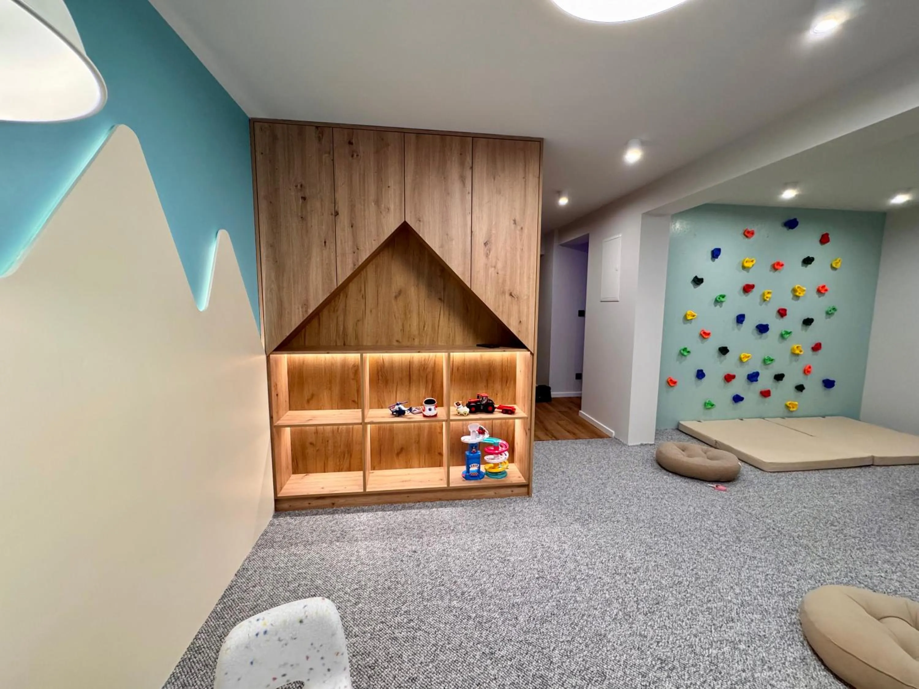 Children play ground in Cyrhla Apartamenty - sauna, playroom, free parking & wifi