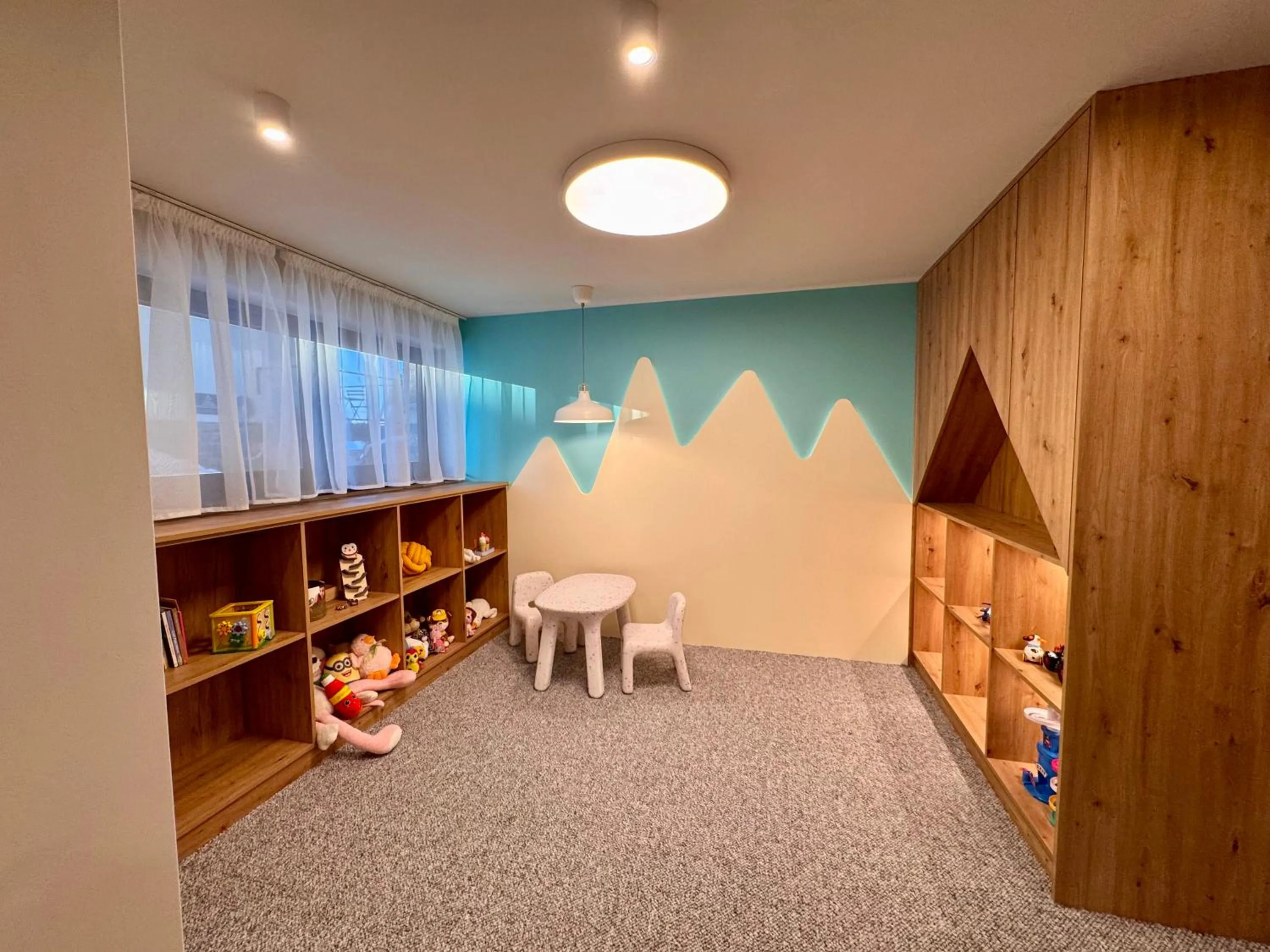 Children play ground in Cyrhla Apartamenty - sauna, playroom, free parking & wifi