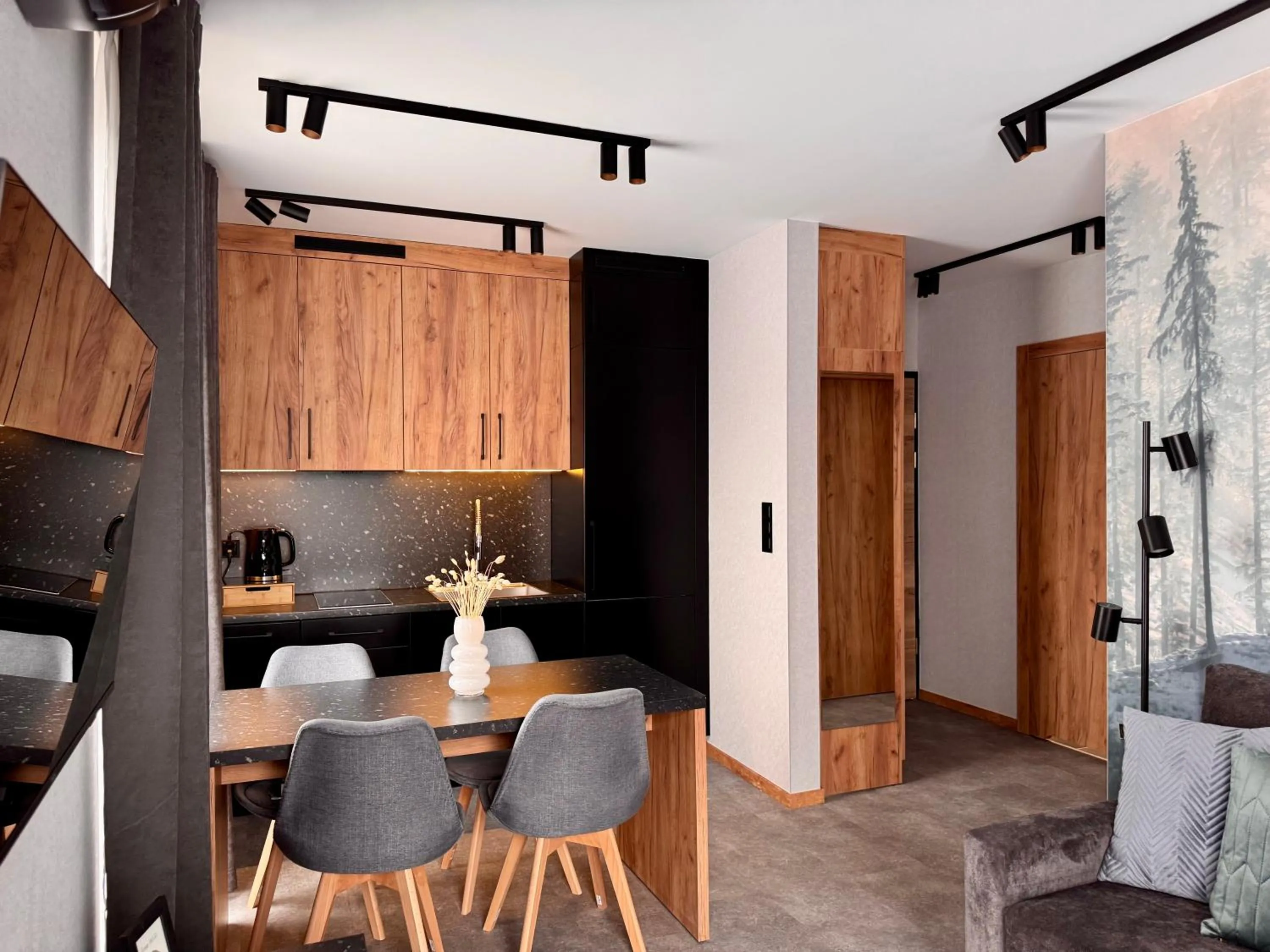 Kitchen or kitchenette in Cyrhla Apartamenty - sauna, playroom, free parking & wifi