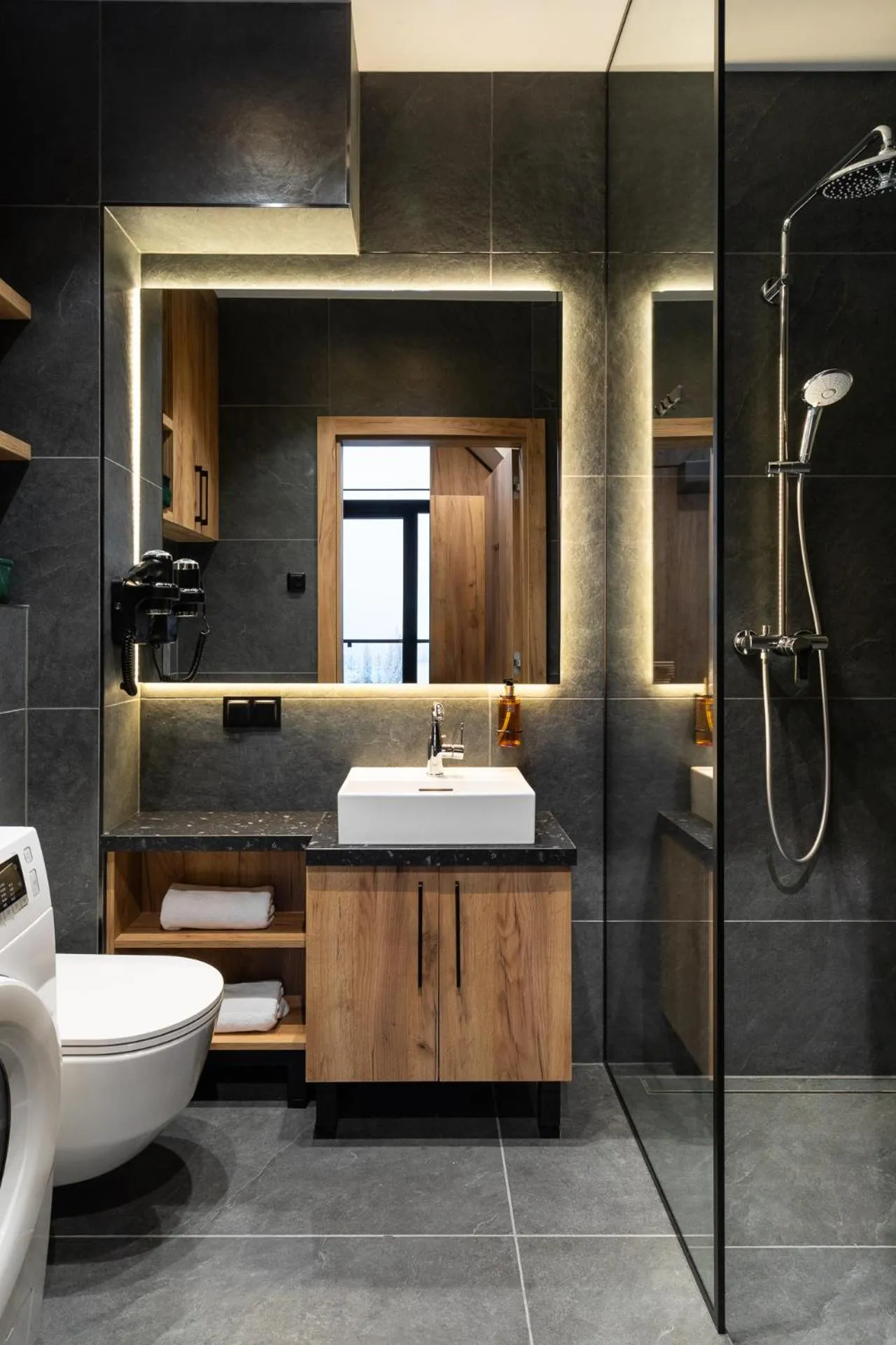 Shower in Cyrhla Apartamenty - sauna, playroom, free parking & wifi
