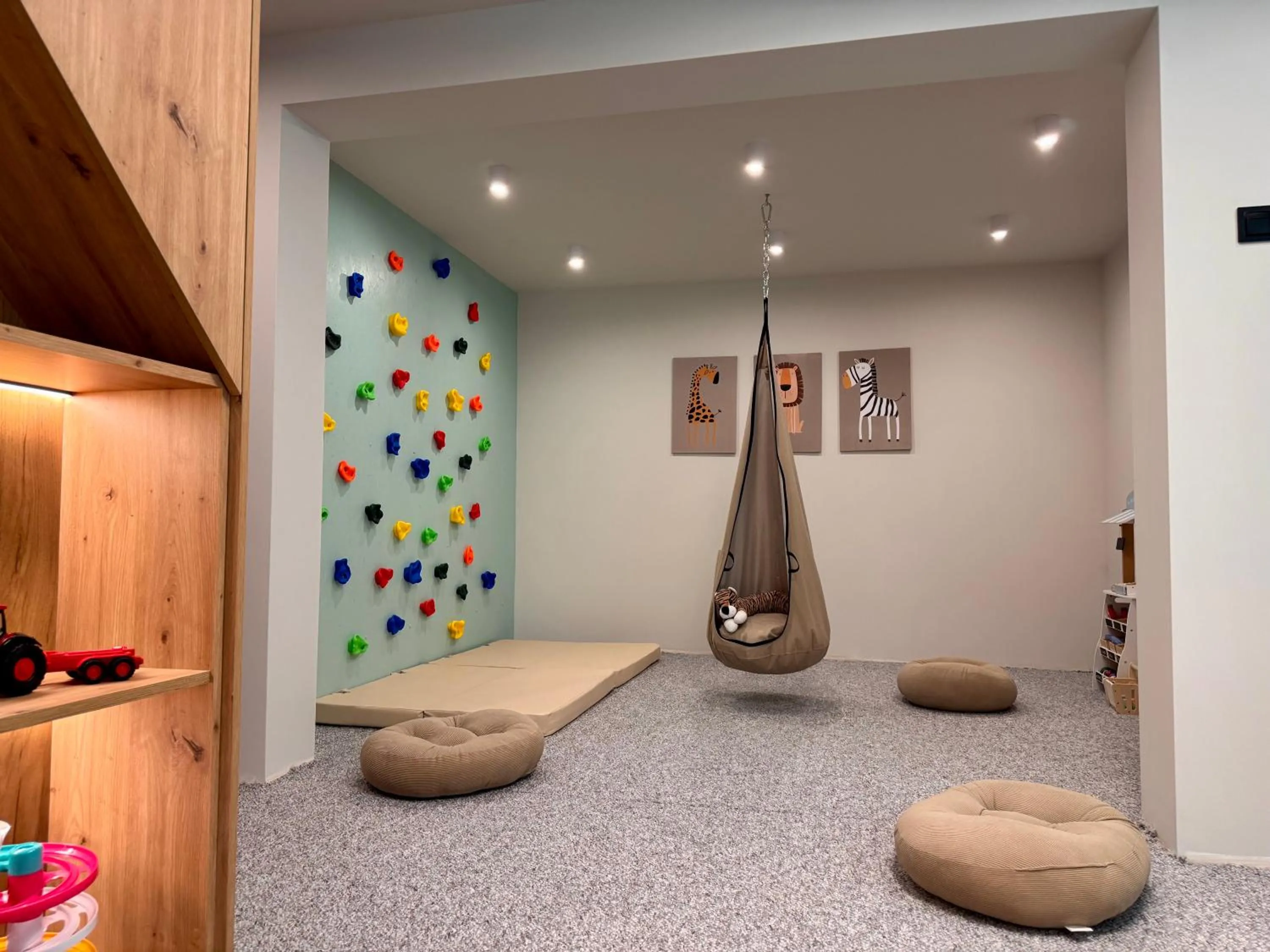 Children play ground in Cyrhla Apartamenty - sauna, playroom, free parking & wifi