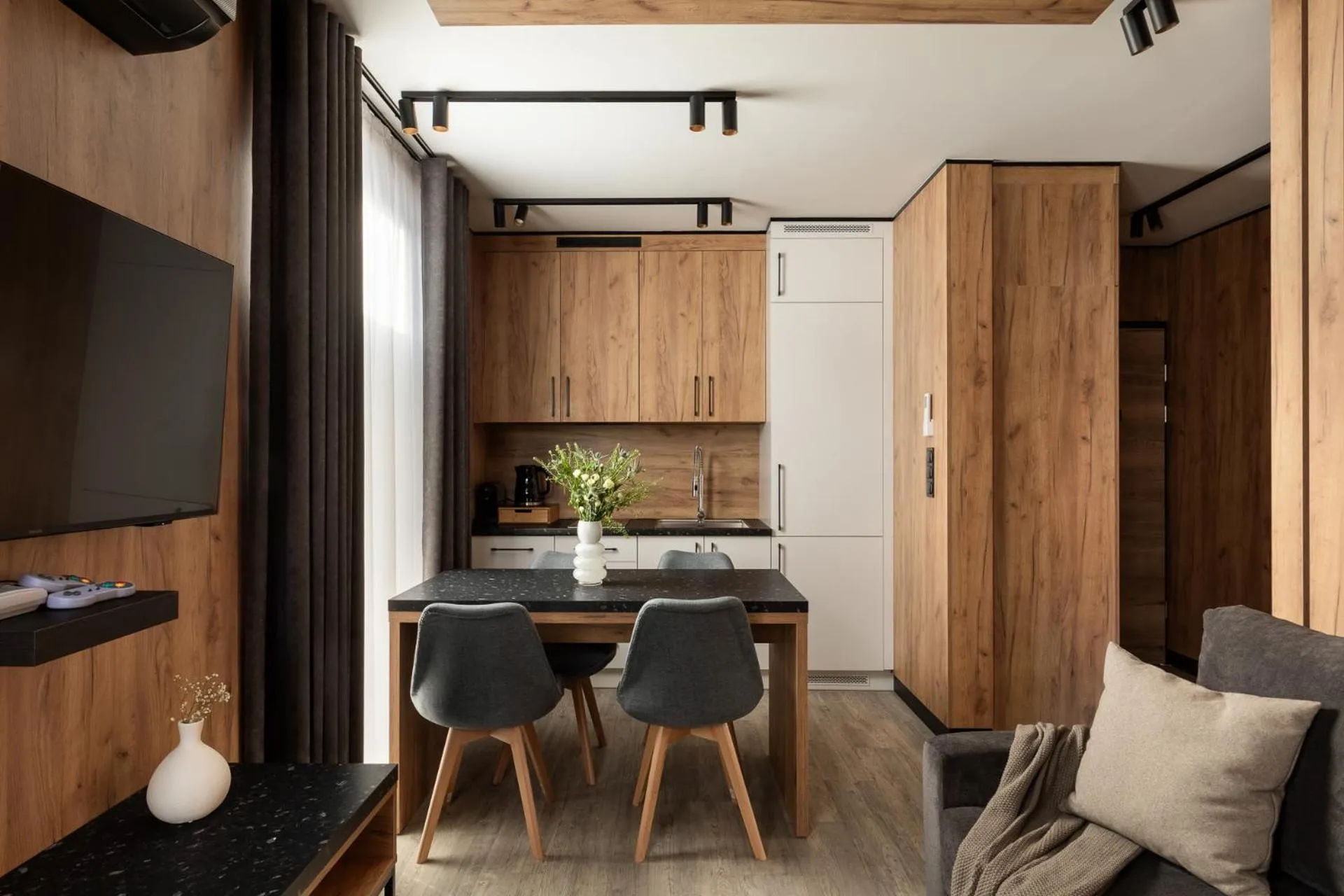 Kitchen or kitchenette in Cyrhla Apartamenty - sauna, playroom, free parking & wifi