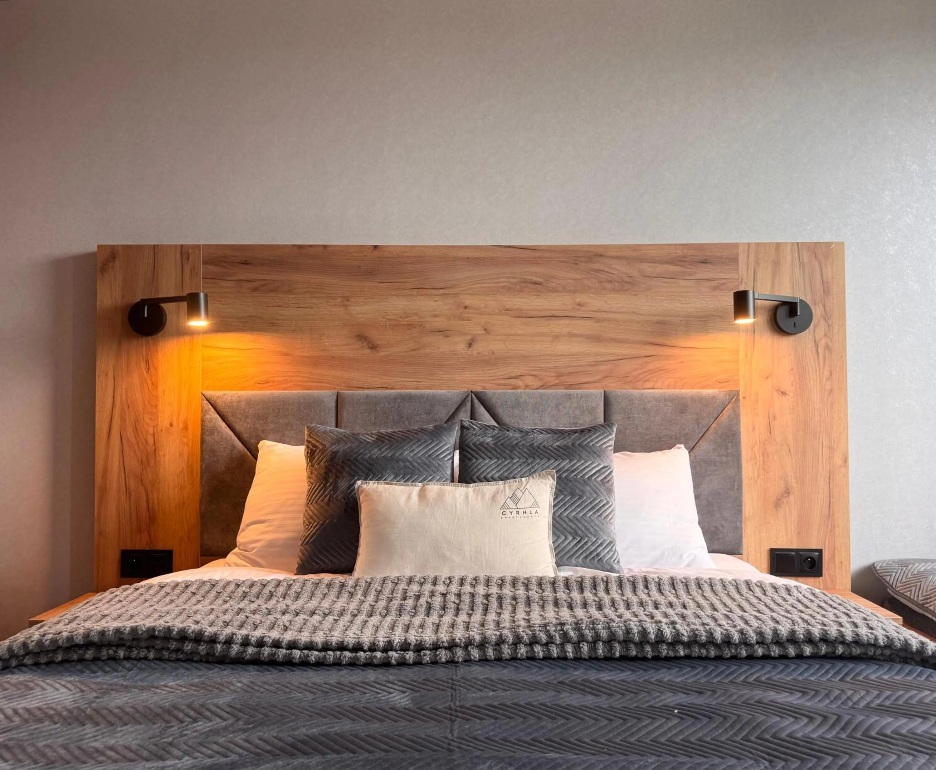 Bed in Cyrhla Apartamenty - sauna, playroom, free parking & wifi