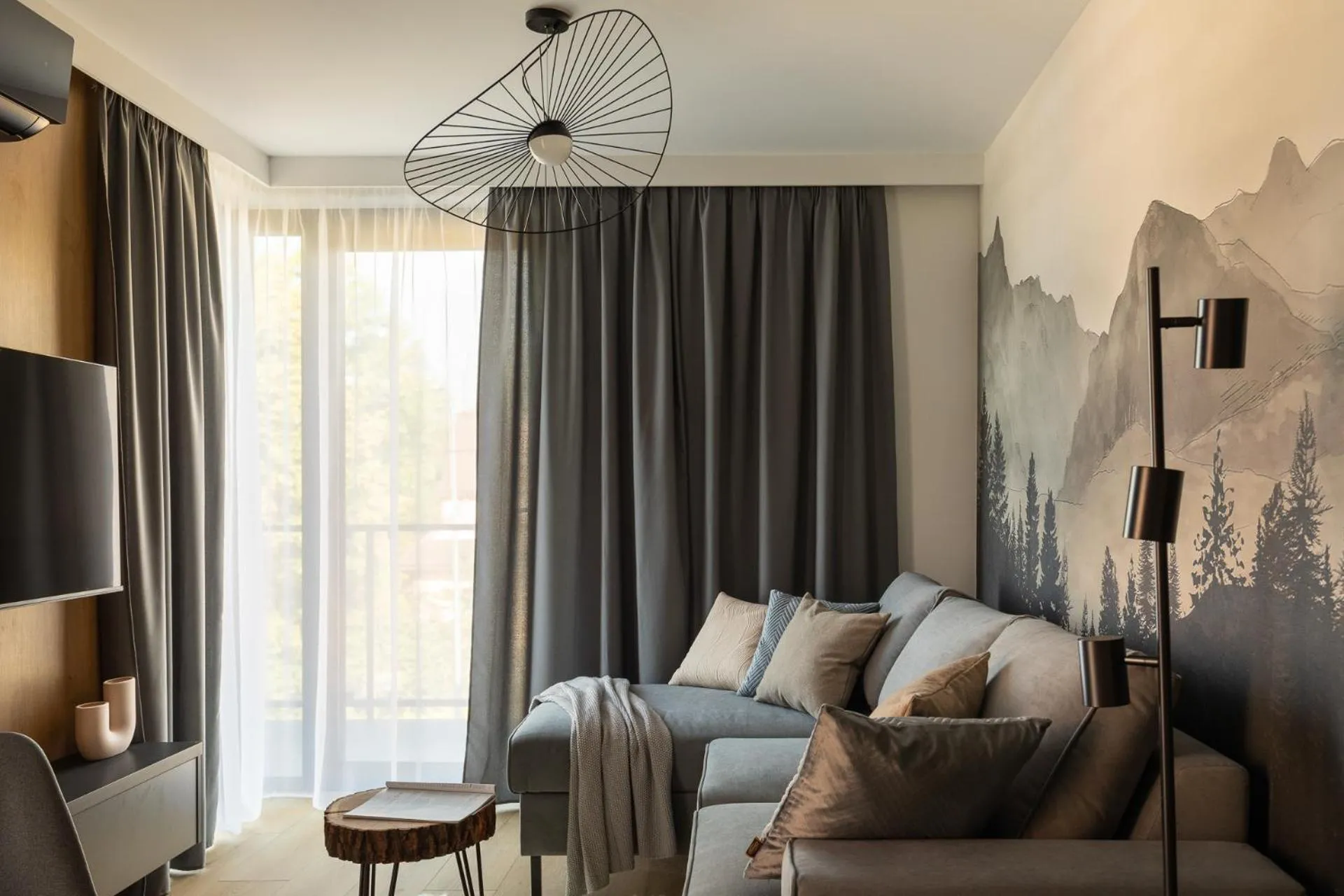 TV and multimedia in Cyrhla Apartamenty - sauna, playroom, free parking & wifi