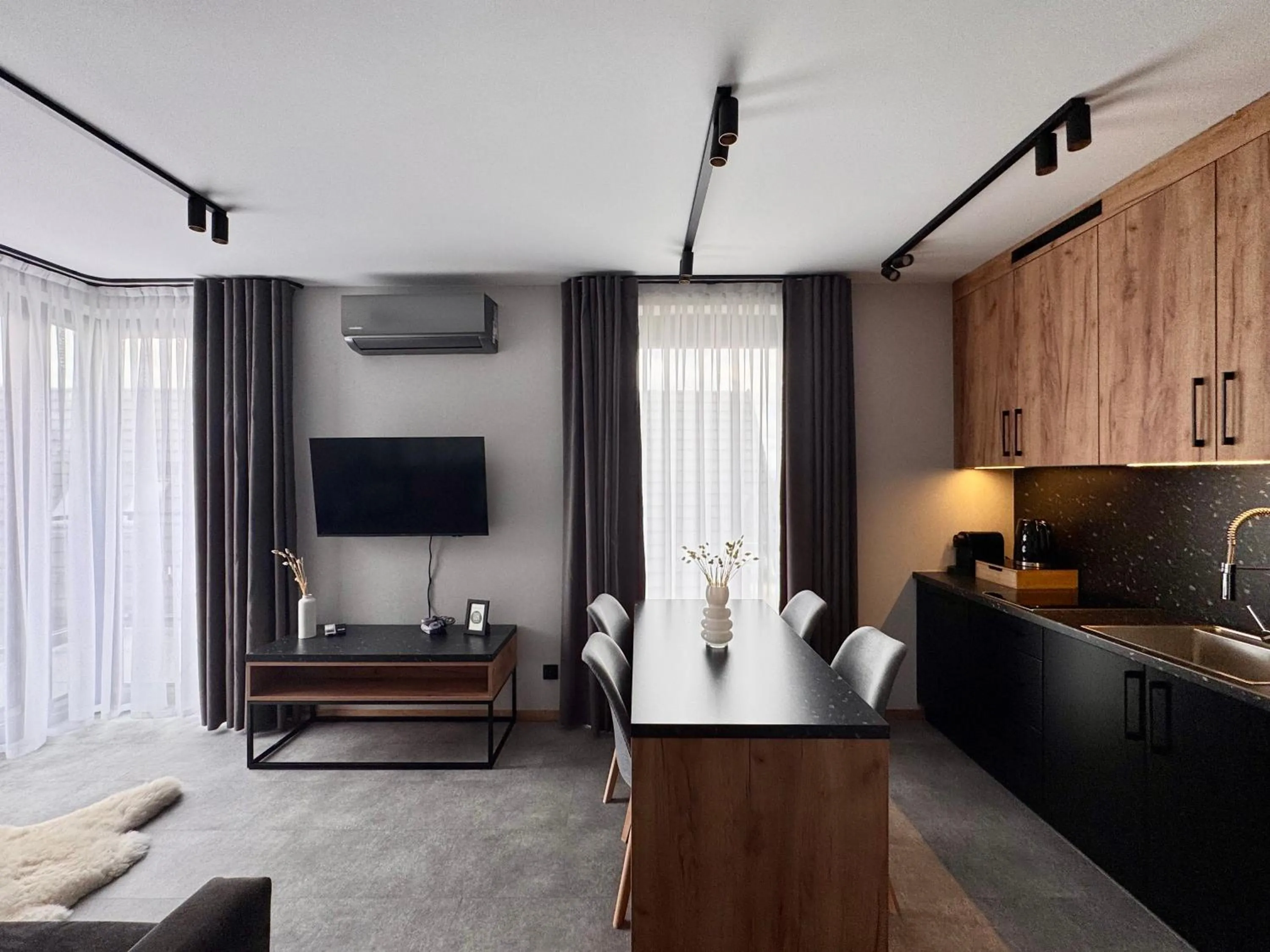 TV and multimedia in Cyrhla Apartamenty - sauna, playroom, free parking & wifi