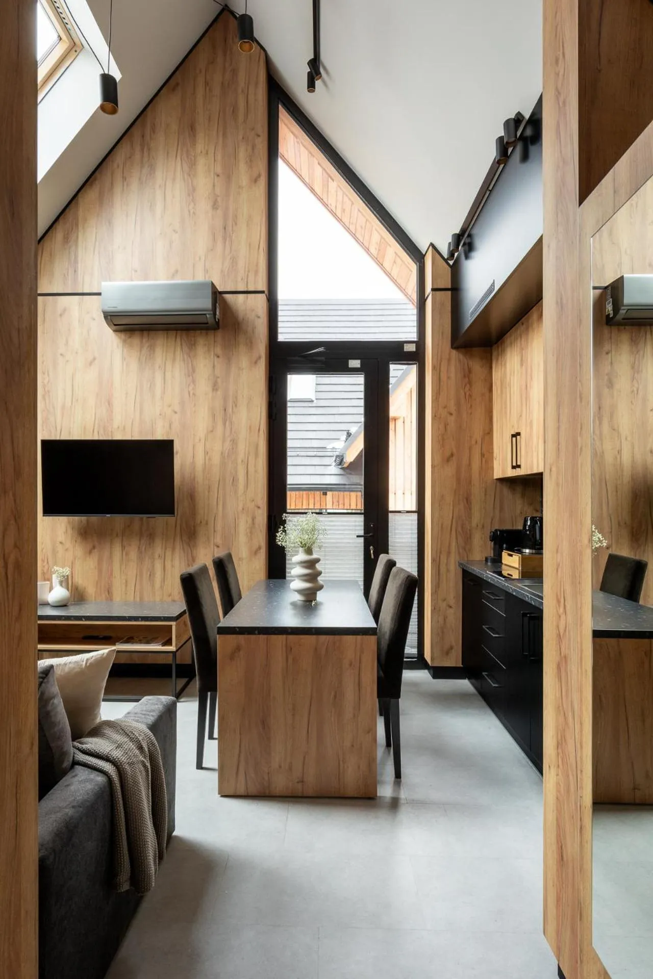 Kitchen or kitchenette in Cyrhla Apartamenty - sauna, playroom, free parking & wifi