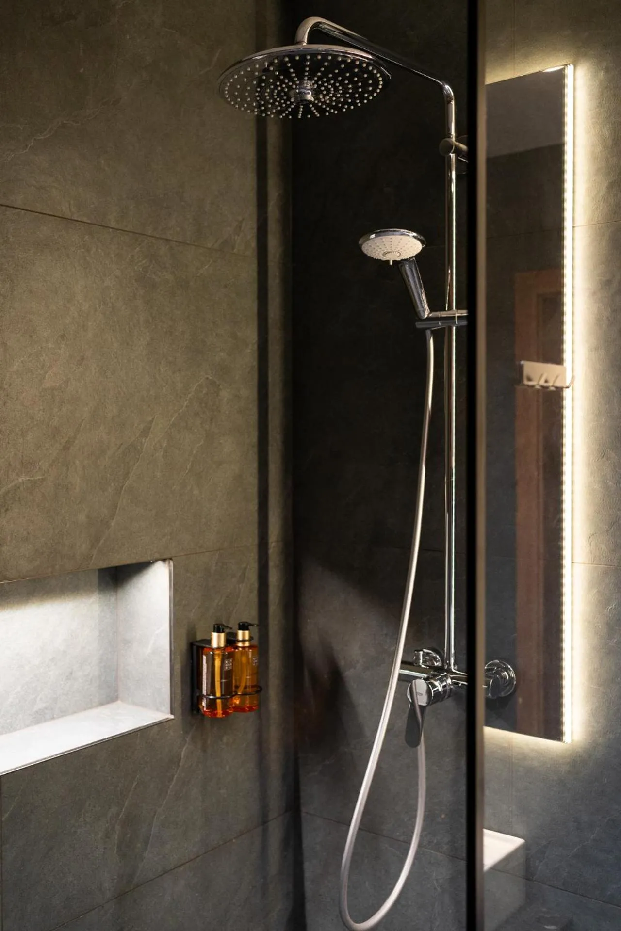 Shower in Cyrhla Apartamenty - sauna, playroom, free parking & wifi