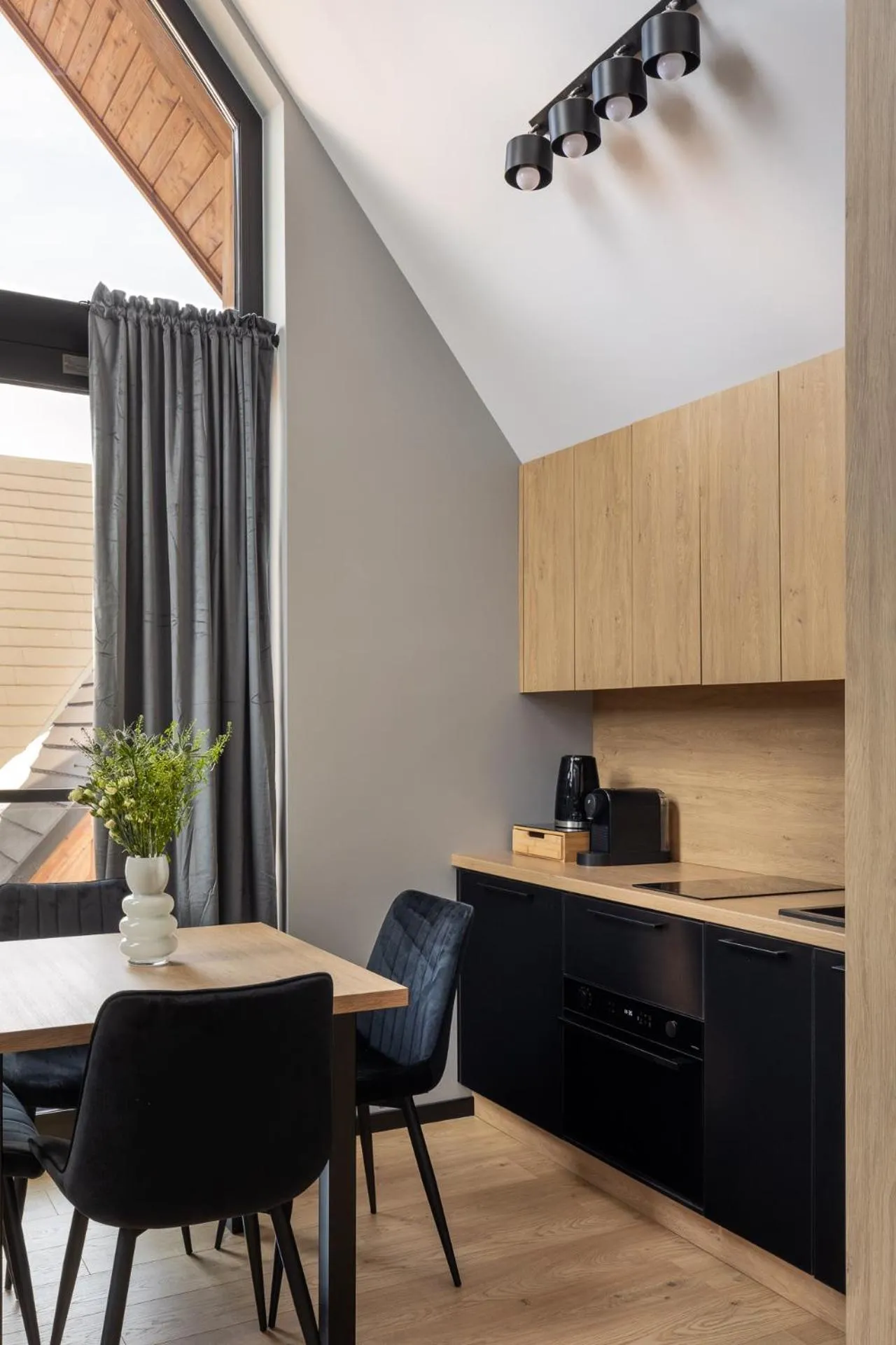 Kitchen or kitchenette in Cyrhla Apartamenty - sauna, playroom, free parking & wifi