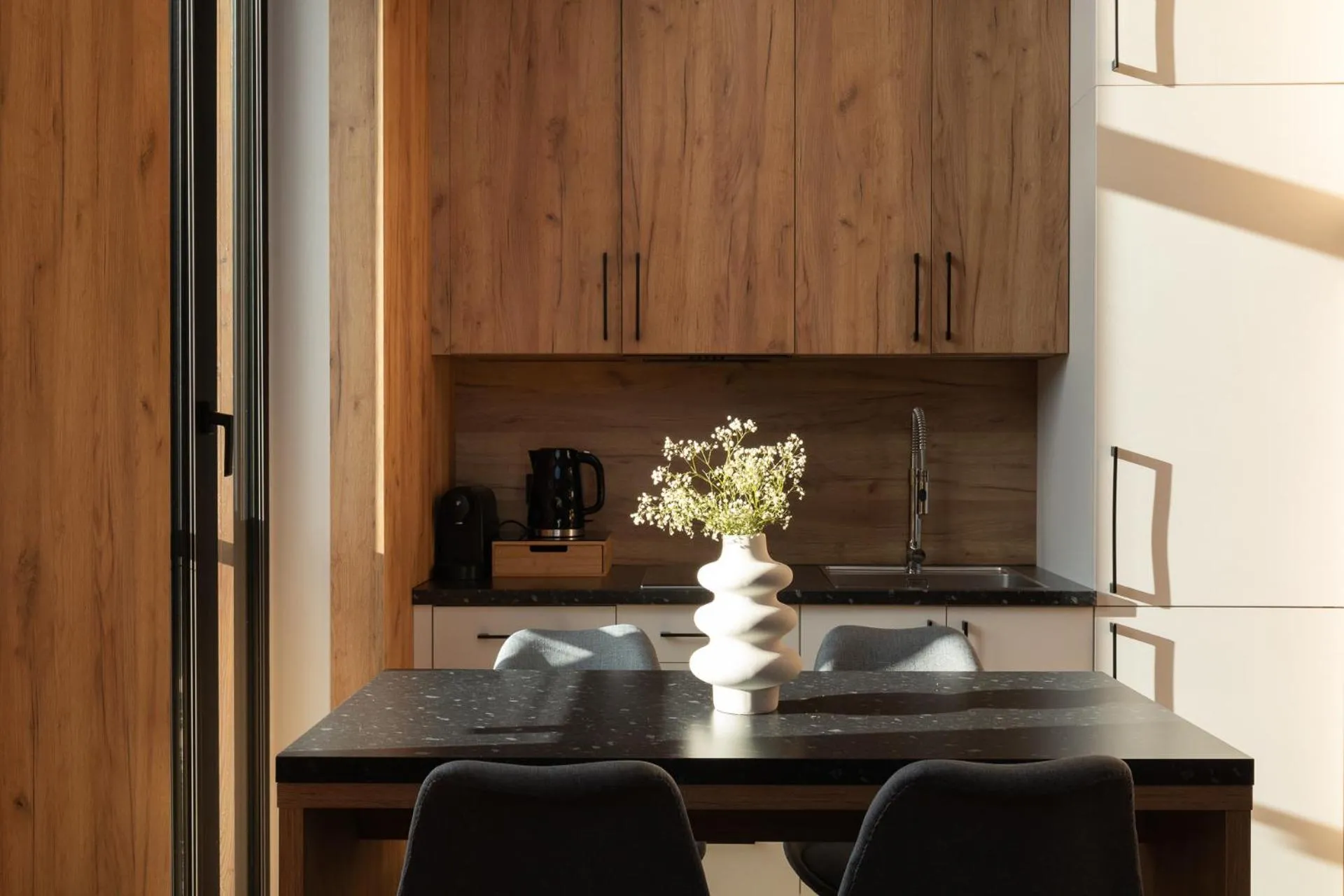 Kitchen or kitchenette in Cyrhla Apartamenty - sauna, playroom, free parking & wifi
