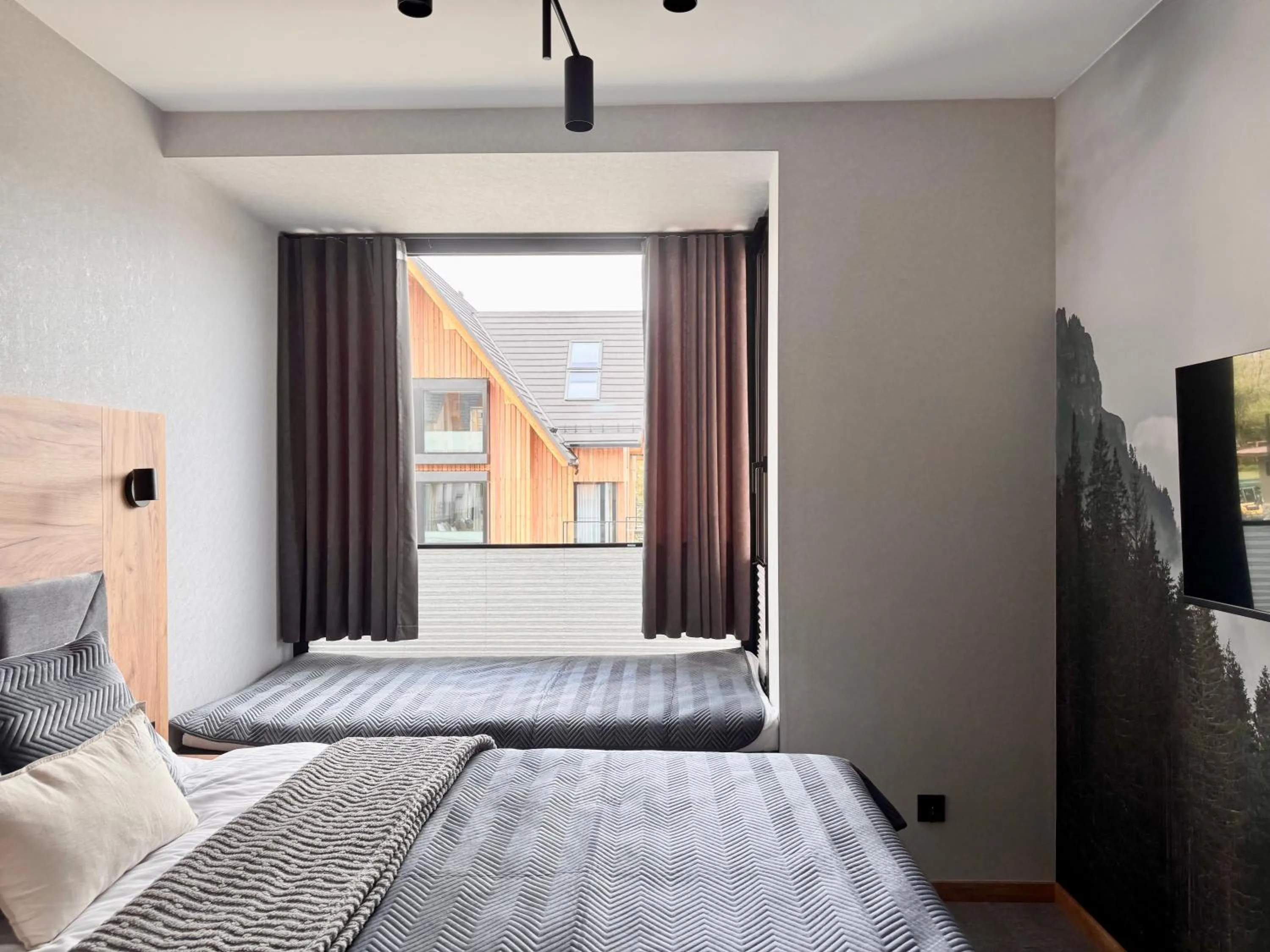 Bed in Cyrhla Apartamenty - sauna, playroom, free parking & wifi