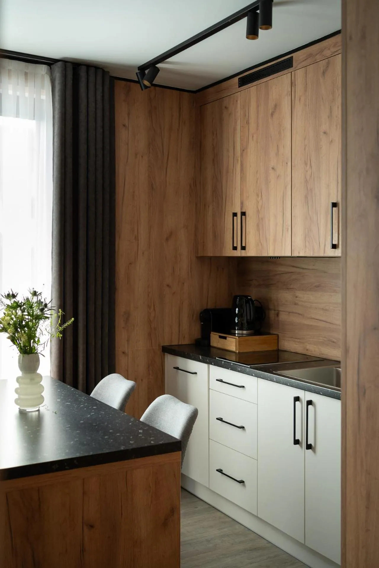 Kitchen or kitchenette in Cyrhla Apartamenty - sauna, playroom, free parking & wifi