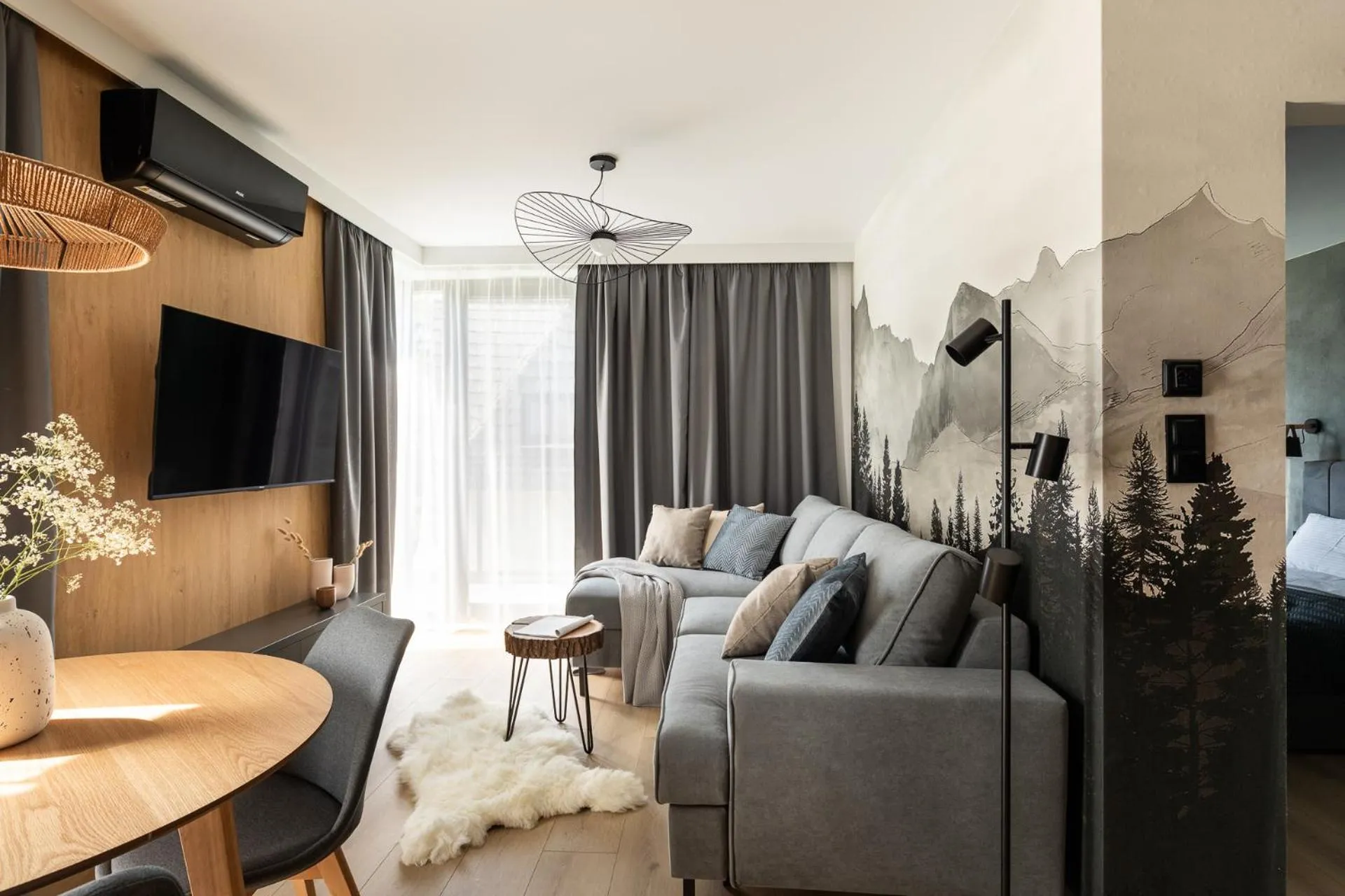 Communal lounge/ TV room in Cyrhla Apartamenty - sauna, playroom, free parking & wifi