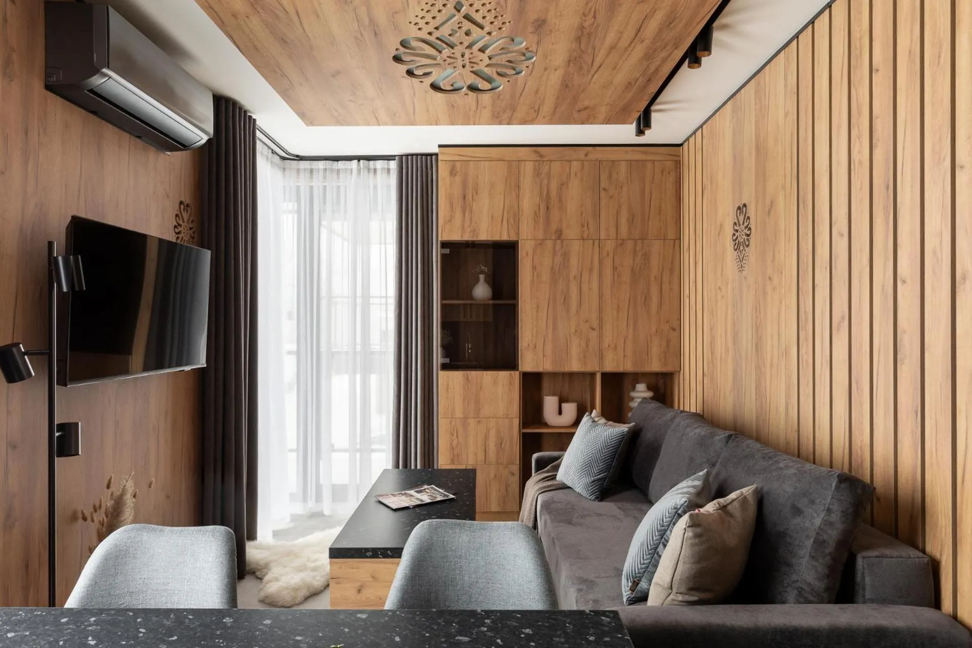 Communal lounge/ TV room in Cyrhla Apartamenty - sauna, playroom, free parking & wifi