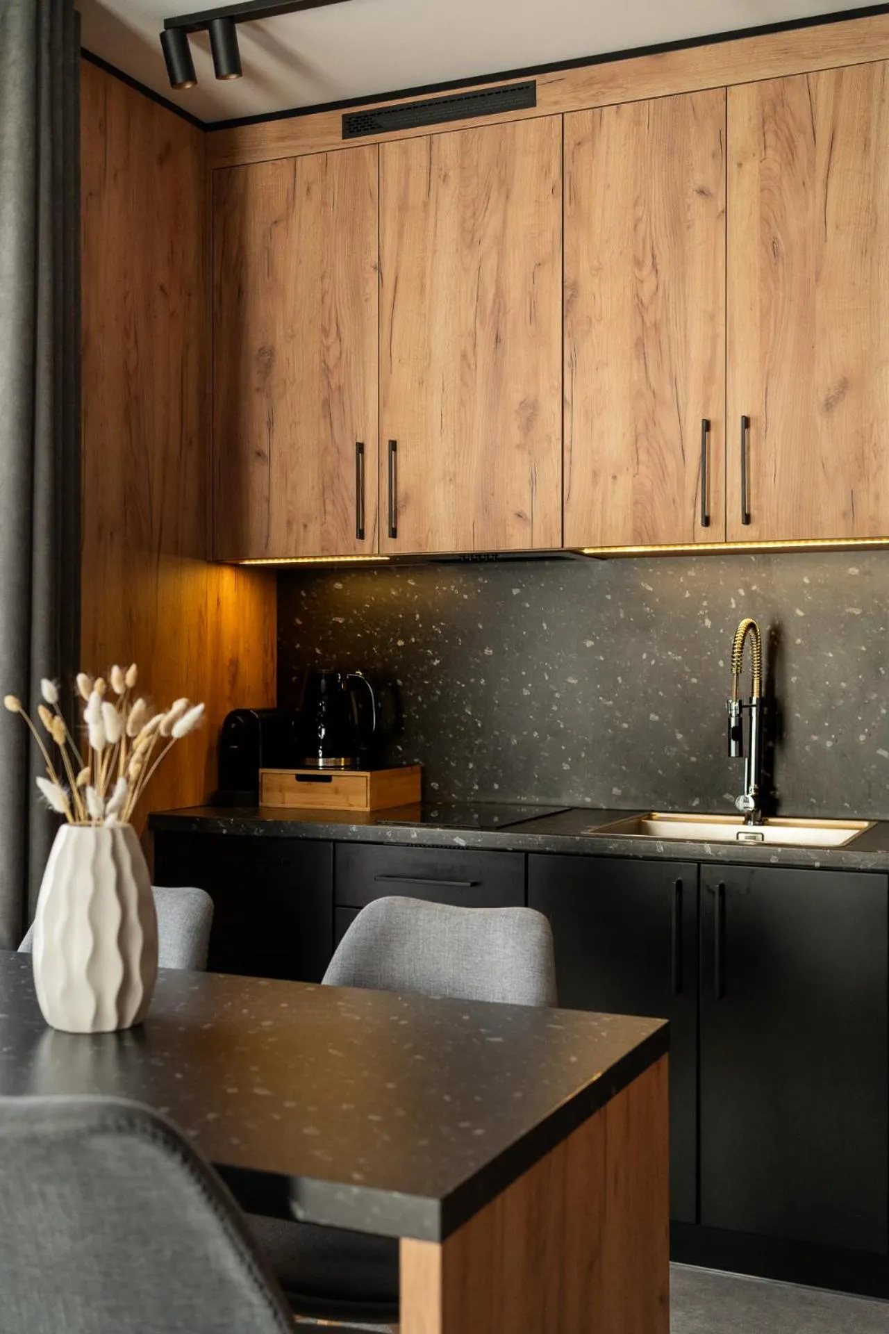 Kitchen or kitchenette in Cyrhla Apartamenty - sauna, playroom, free parking & wifi