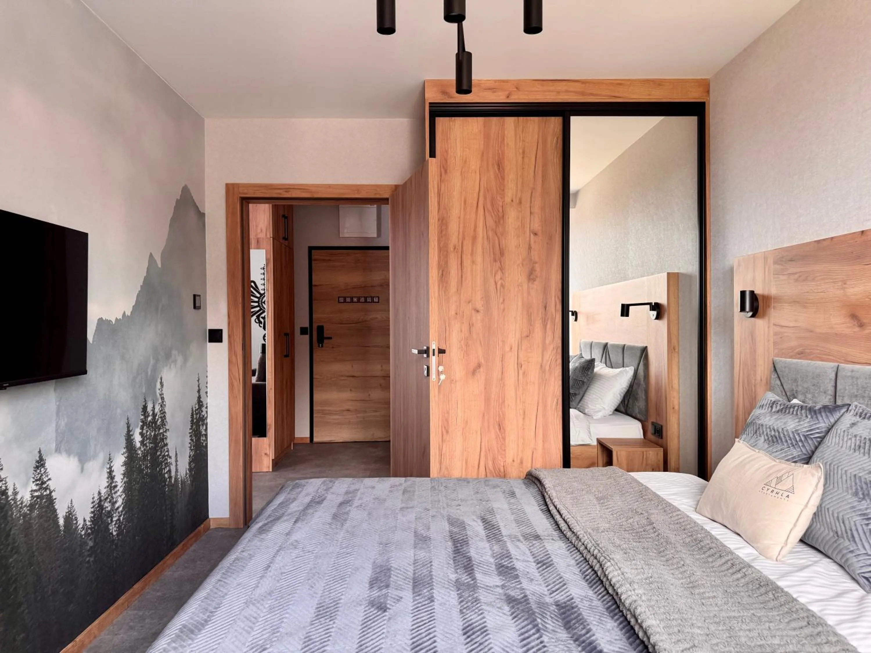 Bed in Cyrhla Apartamenty - sauna, playroom, free parking & wifi