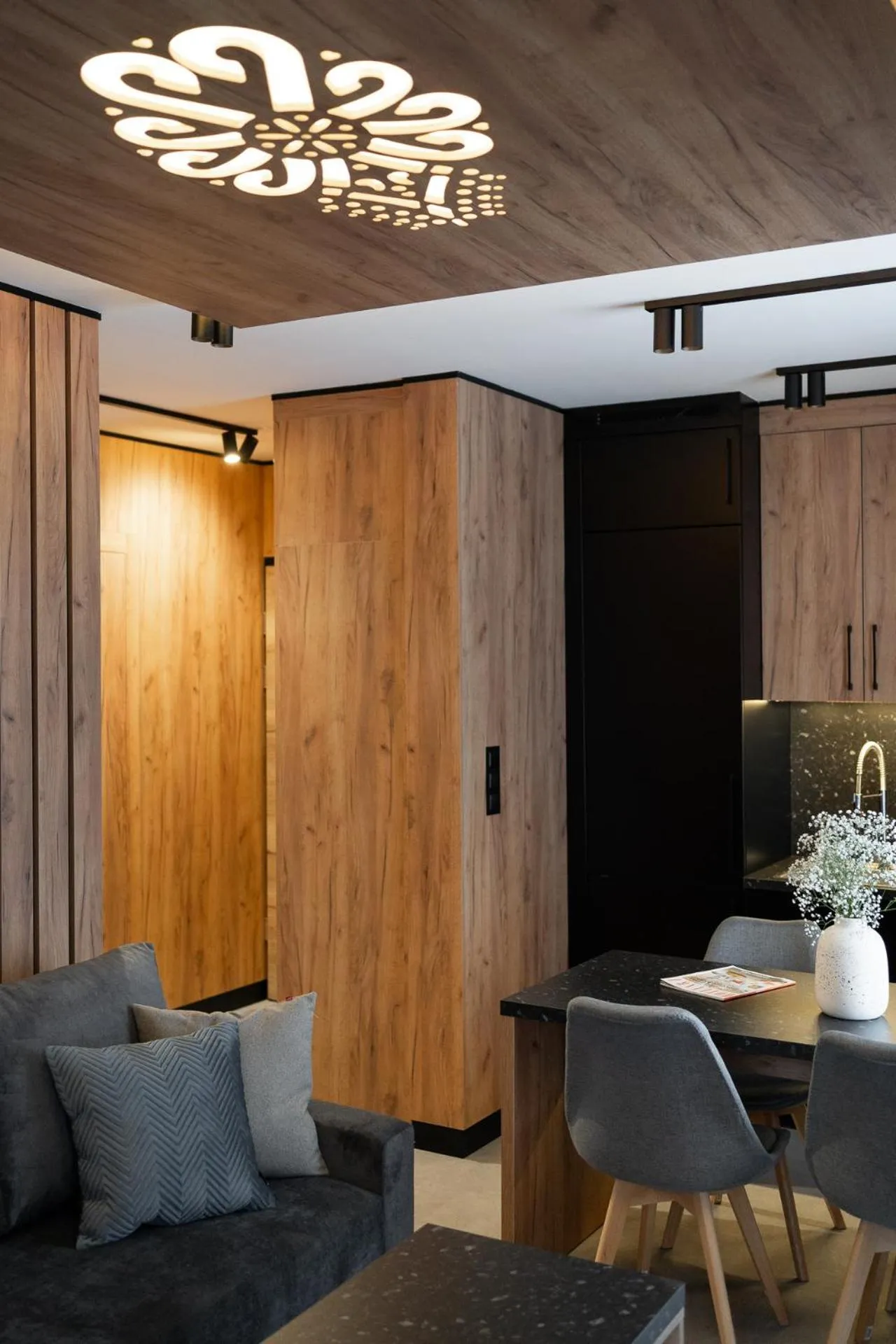 Kitchen or kitchenette in Cyrhla Apartamenty - sauna, playroom, free parking & wifi