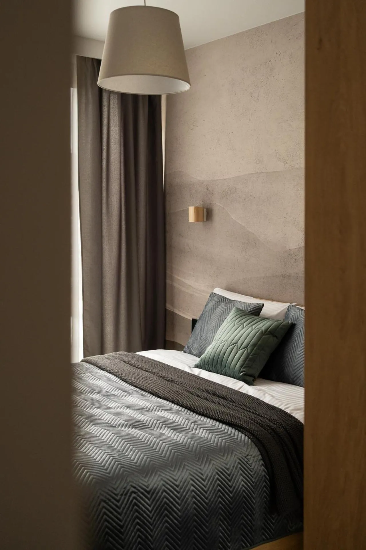 Bed in Cyrhla Apartamenty - sauna, playroom, free parking & wifi