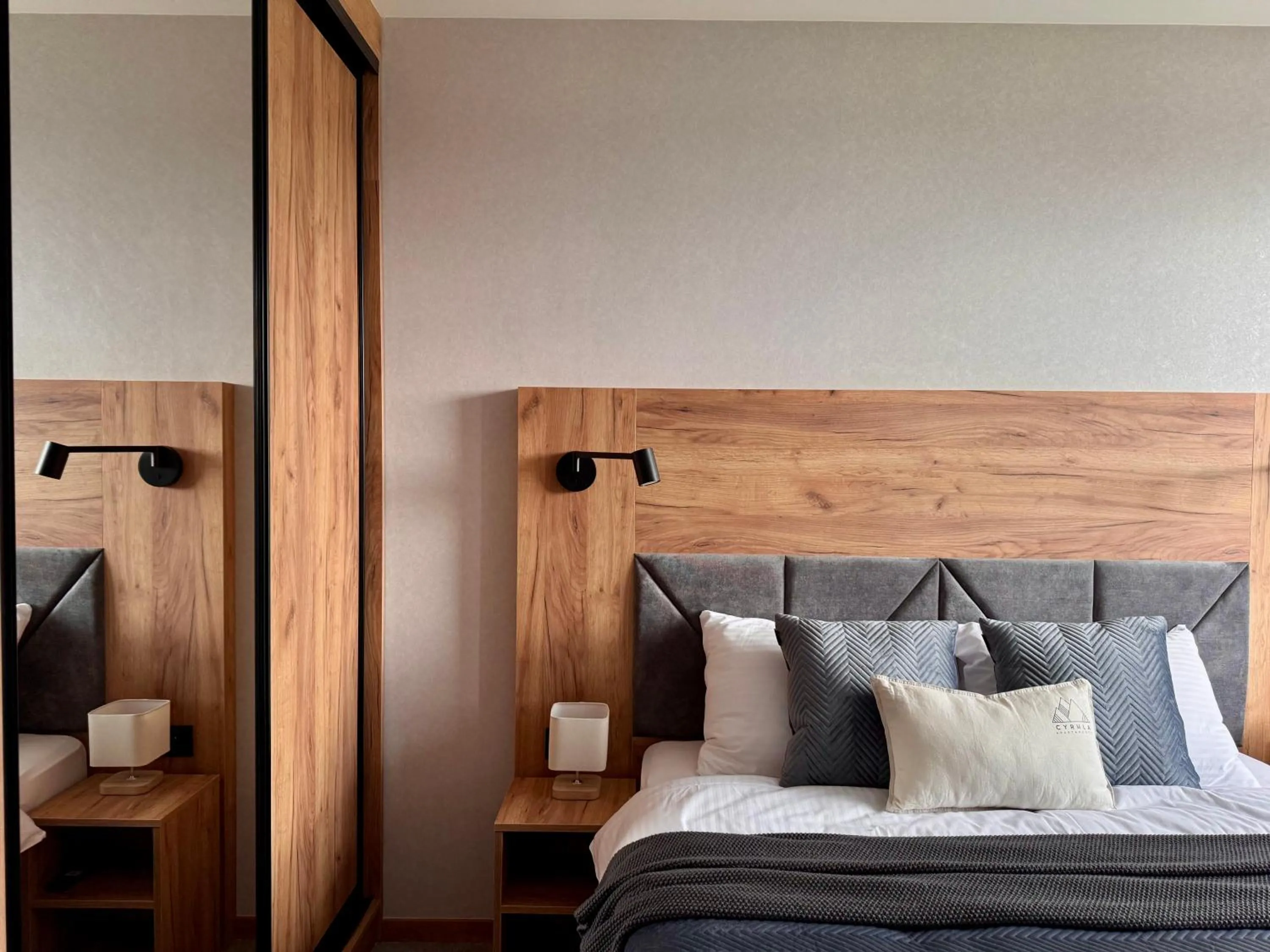Bed in Cyrhla Apartamenty - sauna, playroom, free parking & wifi