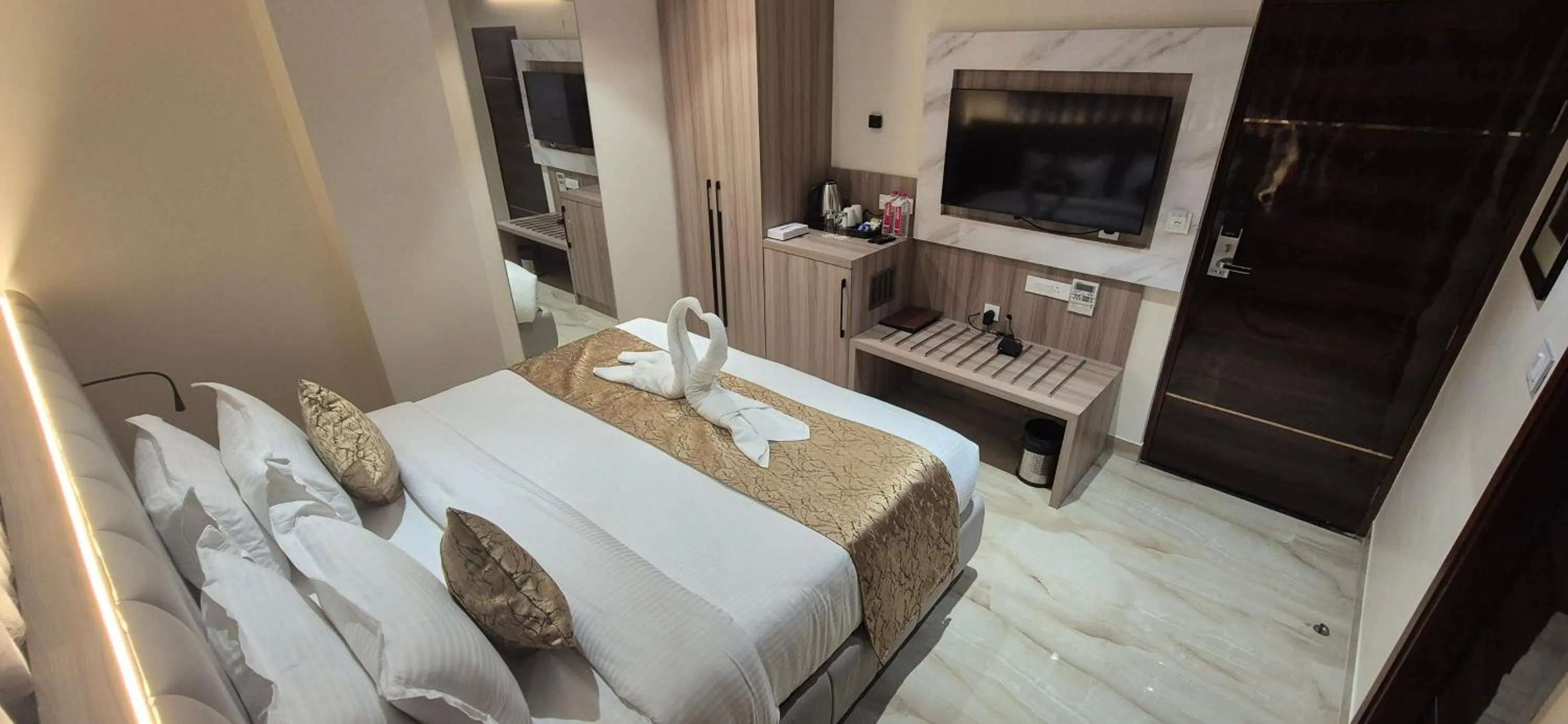 Bed in Hotel Vishwam Residency