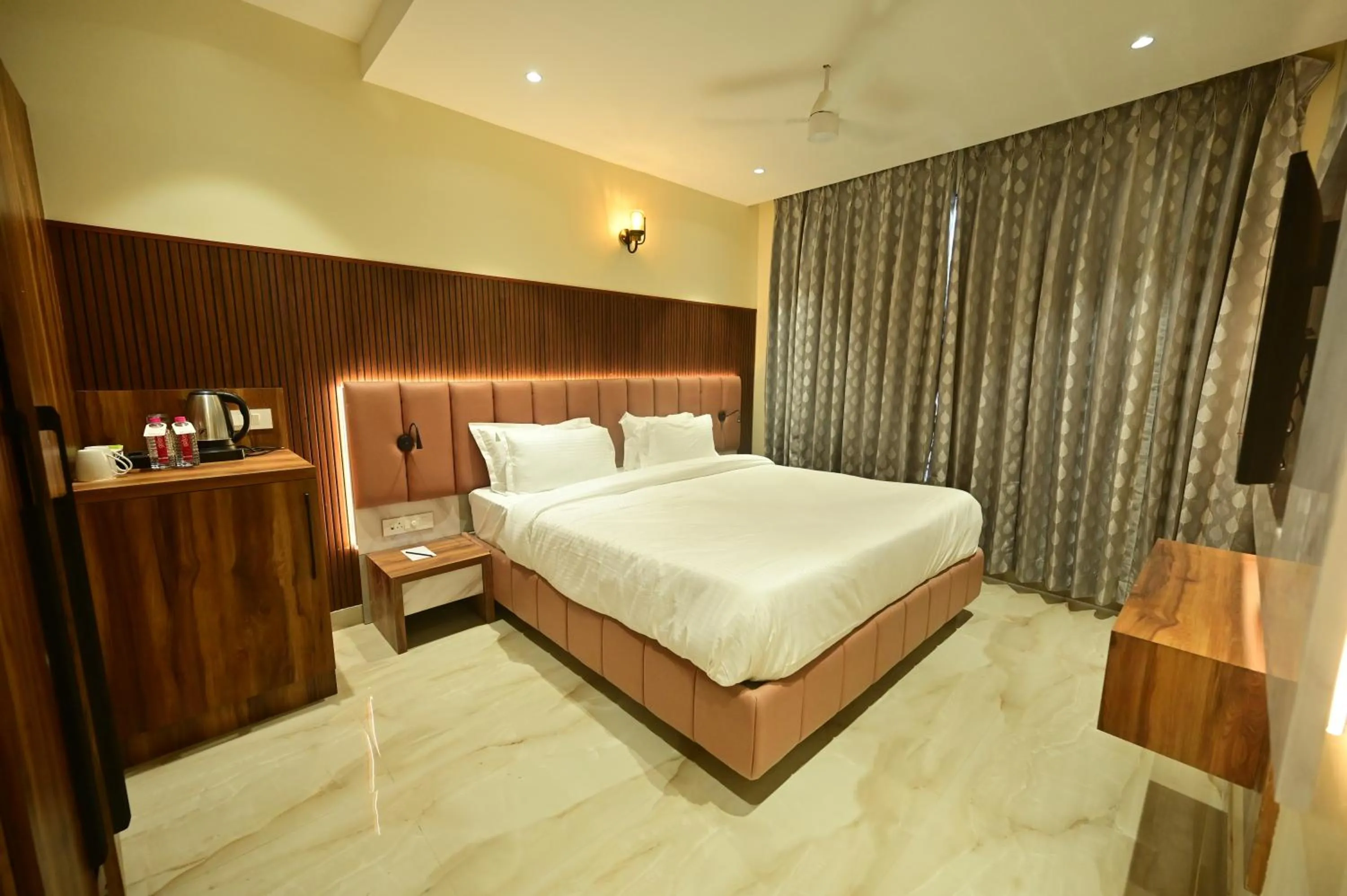 Bed in Hotel Vishwam Residency