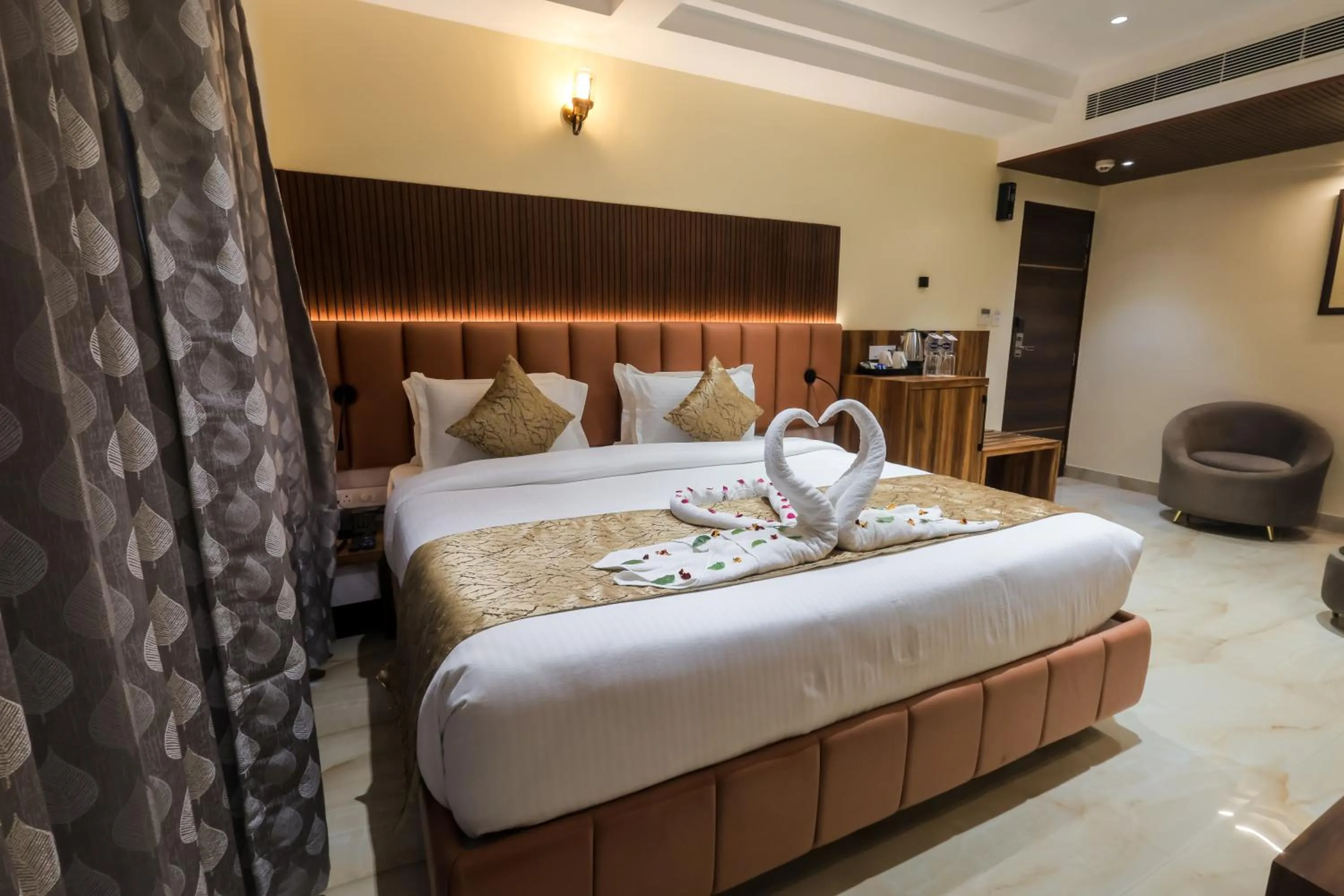 Bed in Hotel Vishwam Residency
