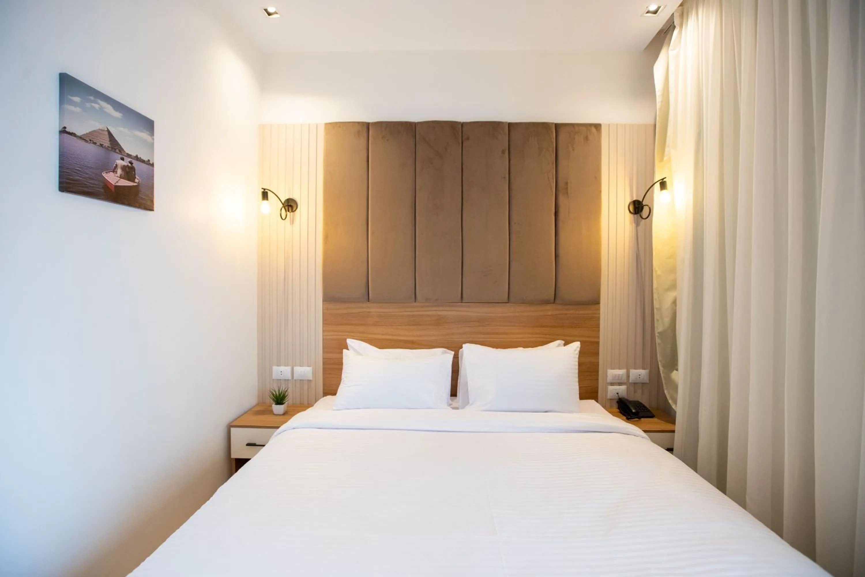Bed in Mazar Pyramids Hotel