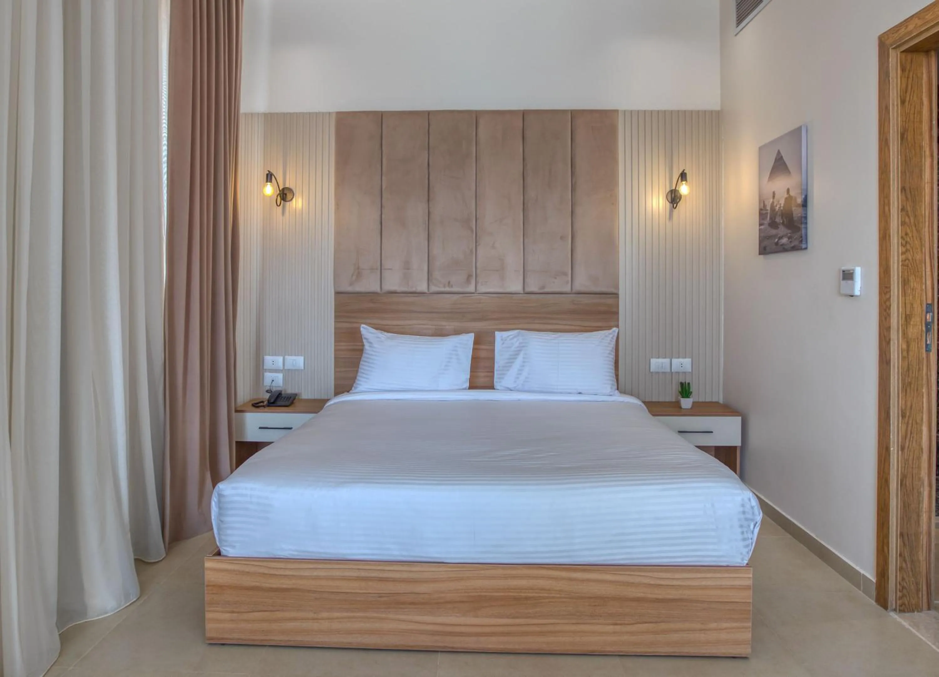 Bed in Mazar Pyramids Hotel
