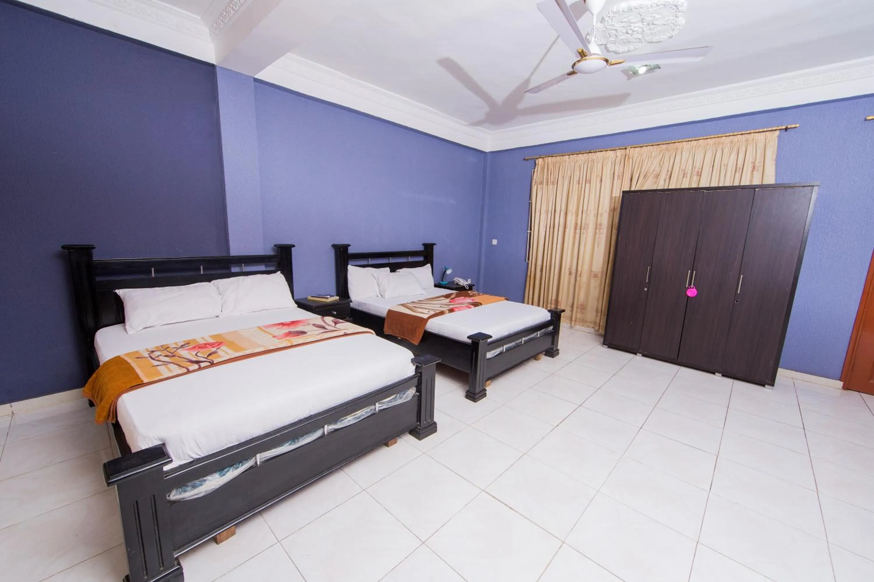 Bed in Pemicsa Hotel Accra