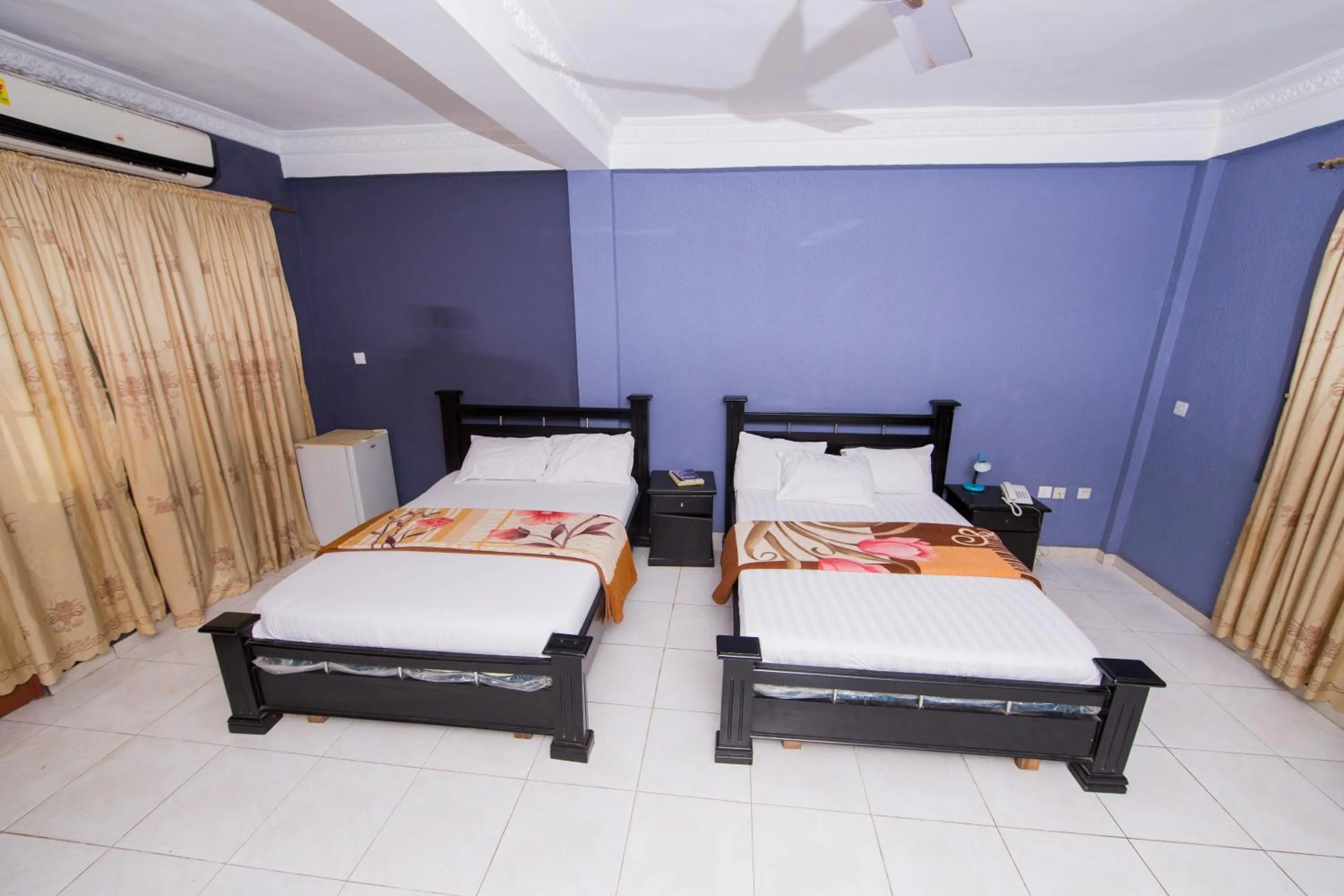 Bed in Pemicsa Hotel Accra